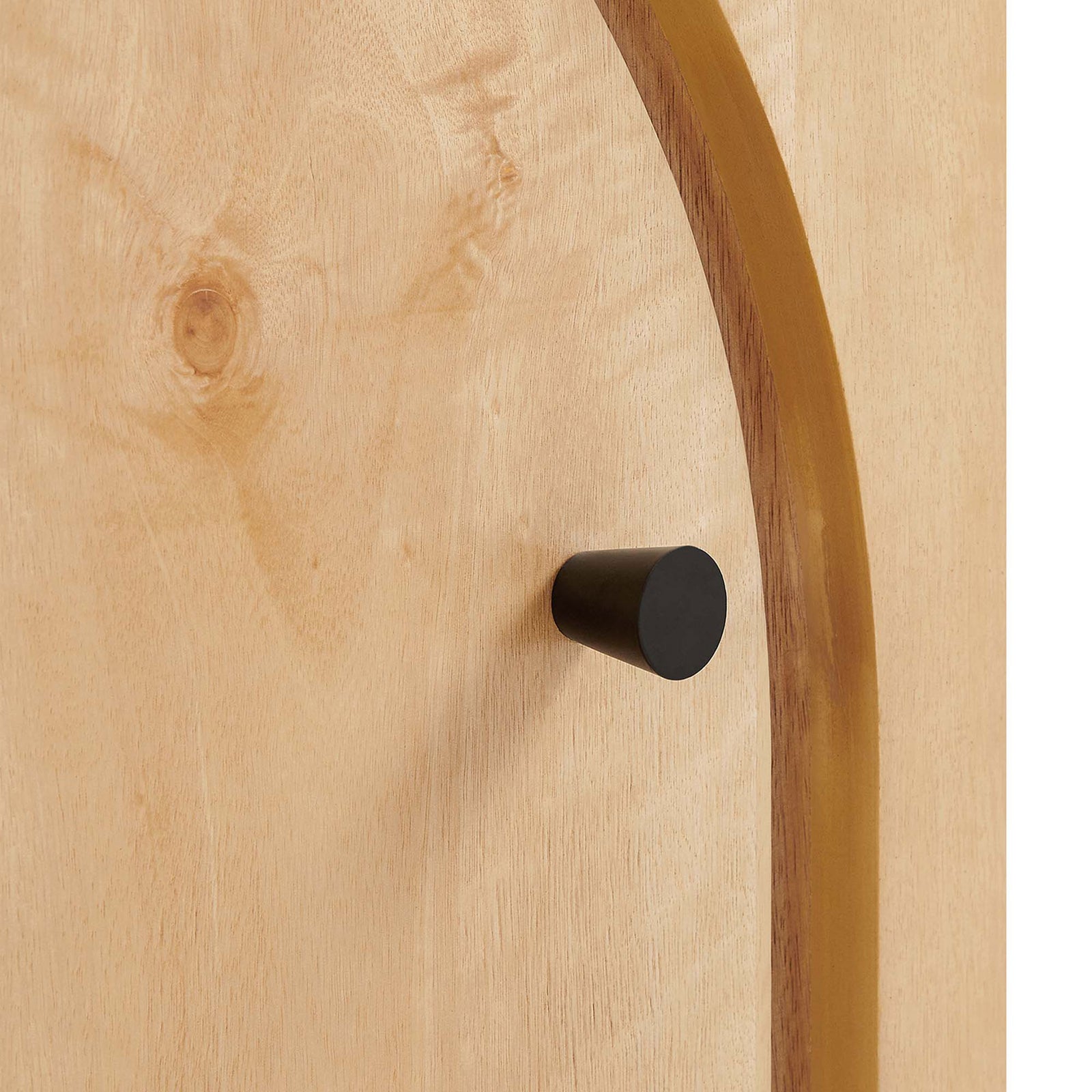 Close-up of arched door edge and round black knob on the oak nightstand. || MOD-7109-OAK || handle_studio
