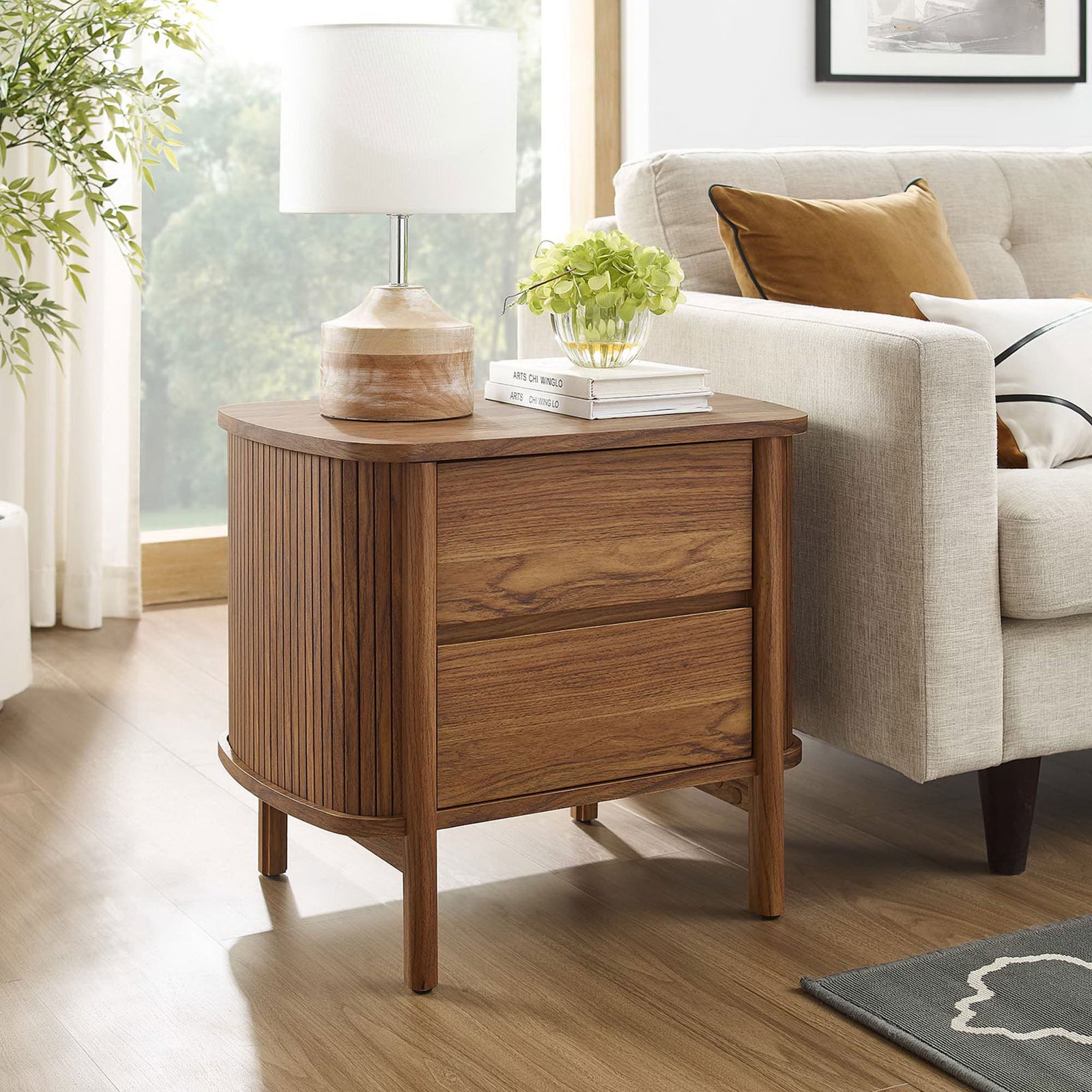 Walnut nightstand used as an end table beside a sofa, adding organic texture to the living space || MOD-7158-WAL || front_angle_room