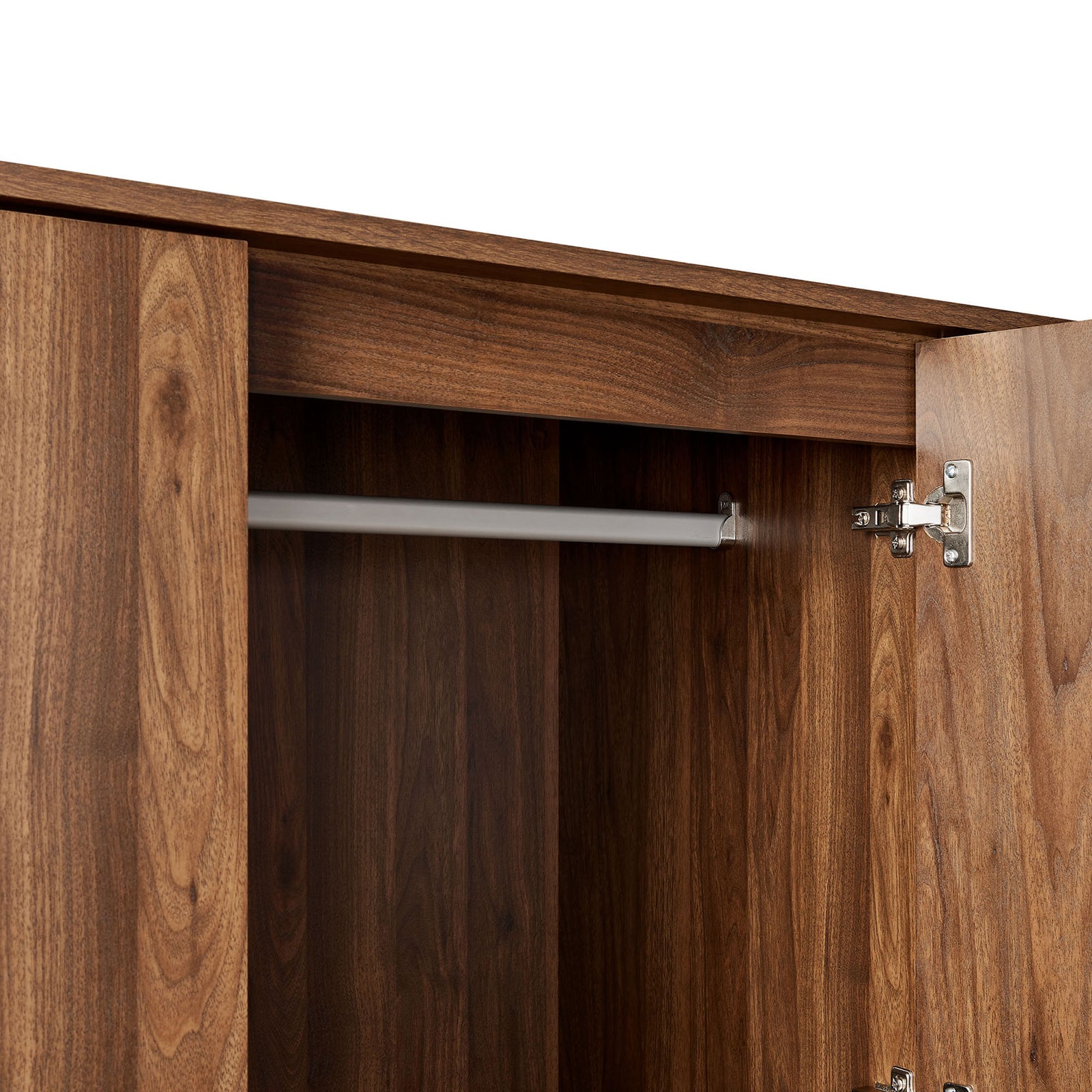 Interior wardrobe detail with sturdy metal clothing bar and metal hinges. || MOD-7164-WAL || detail_studio