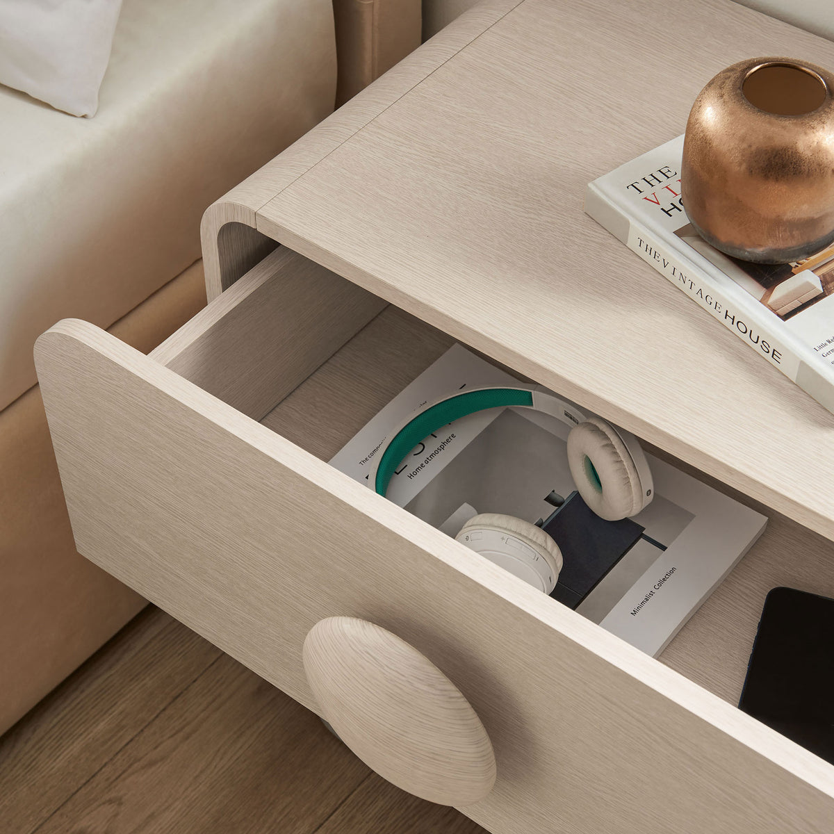 Open drawer of the ash nightstand revealing smooth interior space for headphones, books, and bedside essentials || MOD-7181-ASH || storage_open_room