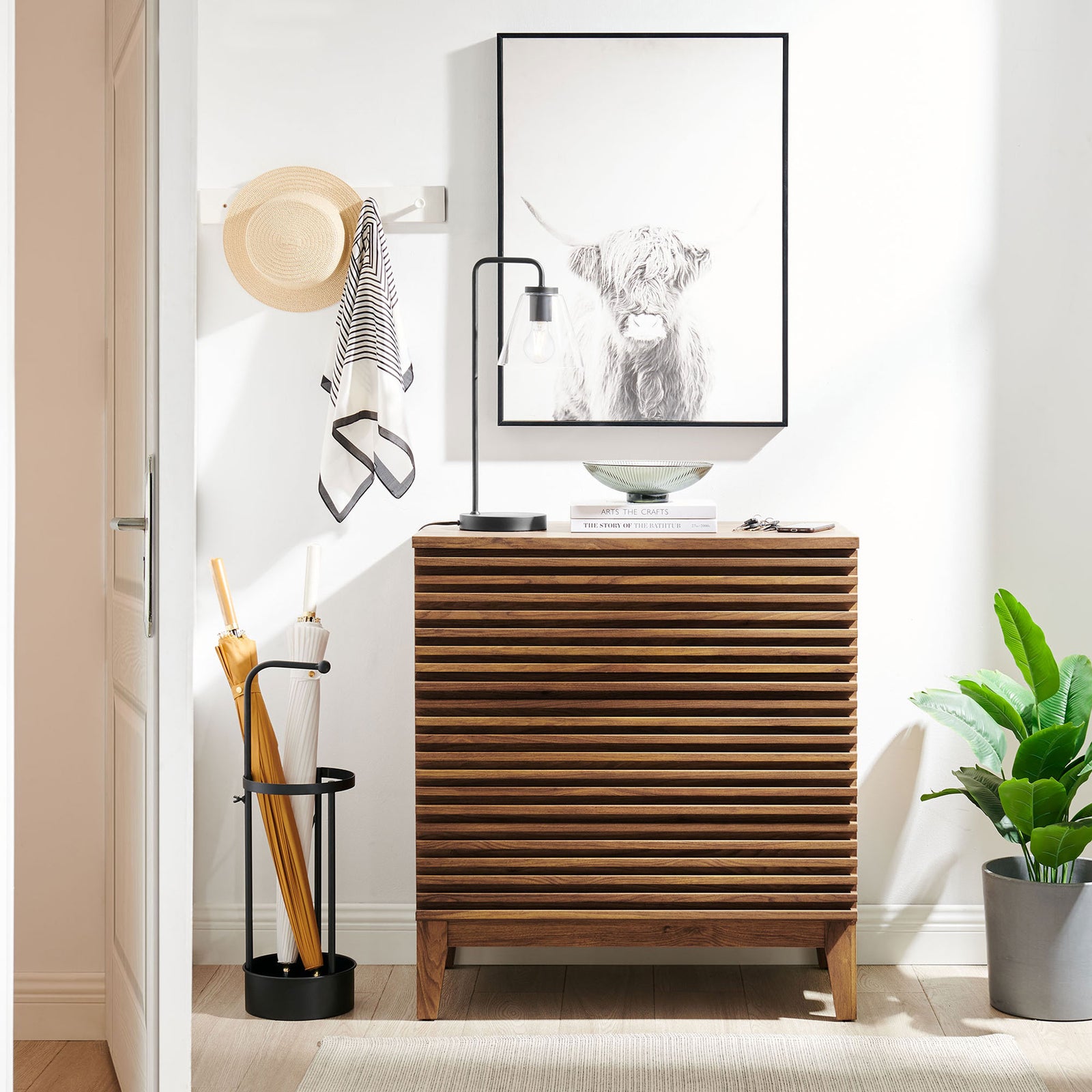 Versatile slatted front cabinet adds warm walnut storage and style to an entryway or hallway || MOD-7201-WAL || front_angle_room