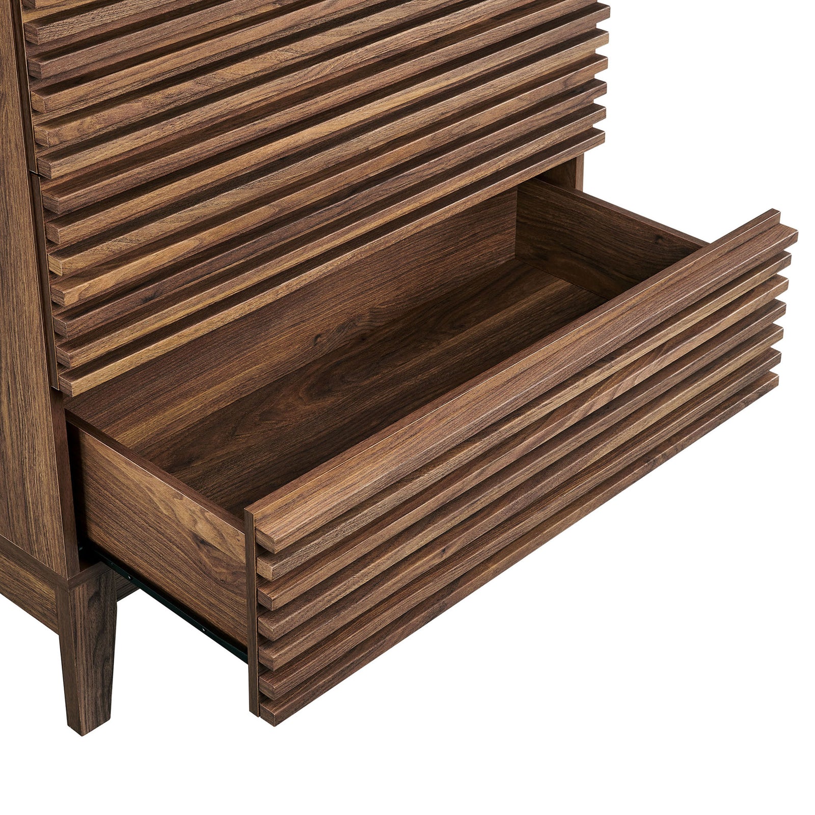 Open drawer reveals deep storage space and a sturdy wood interior beneath the fluted drawer front. || MOD-7203-WAL || storage_open_studio