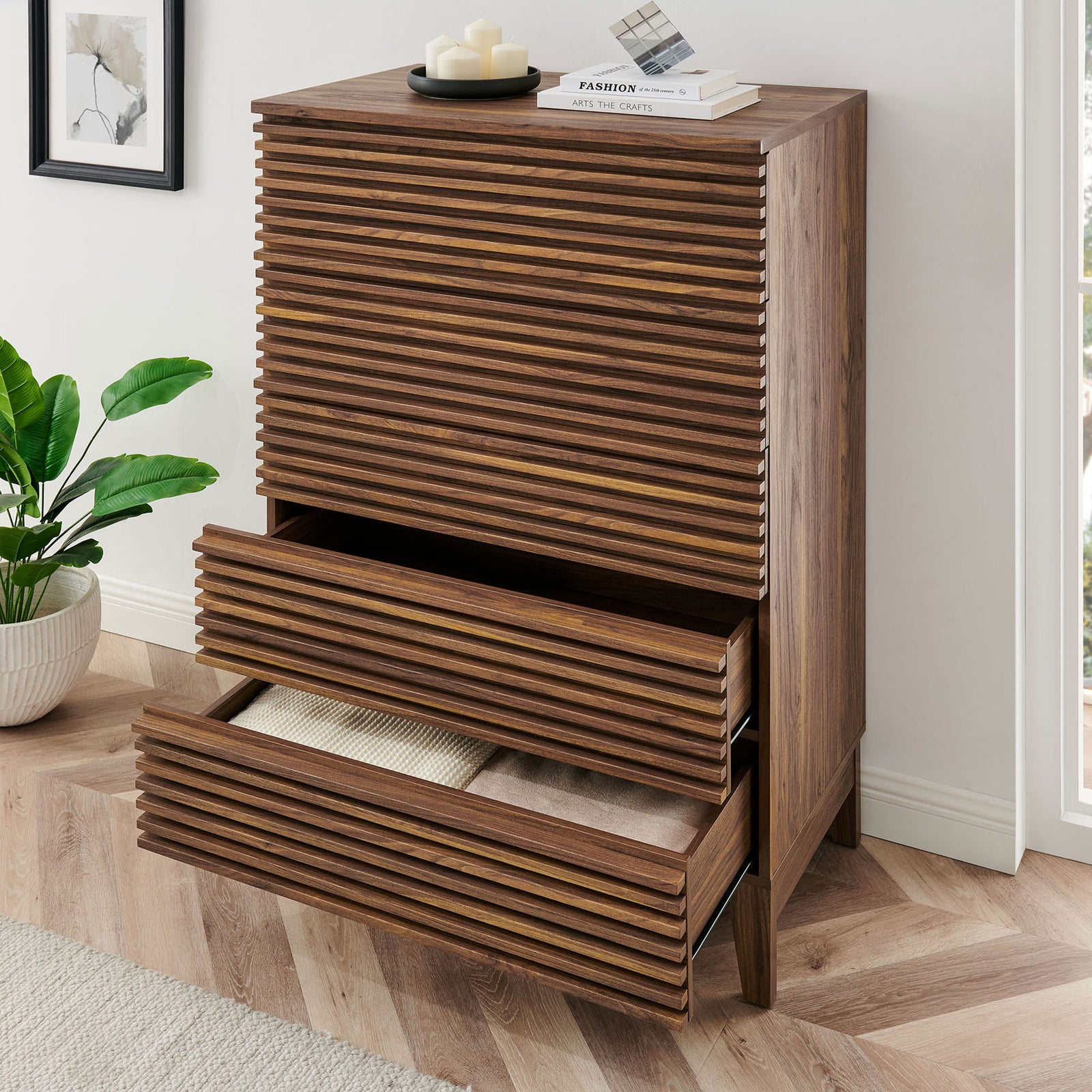 Walnut chest with lower drawers open, showing organized storage and modern slatted detail in the room. || MOD-7203-WAL || front_angle_open_room