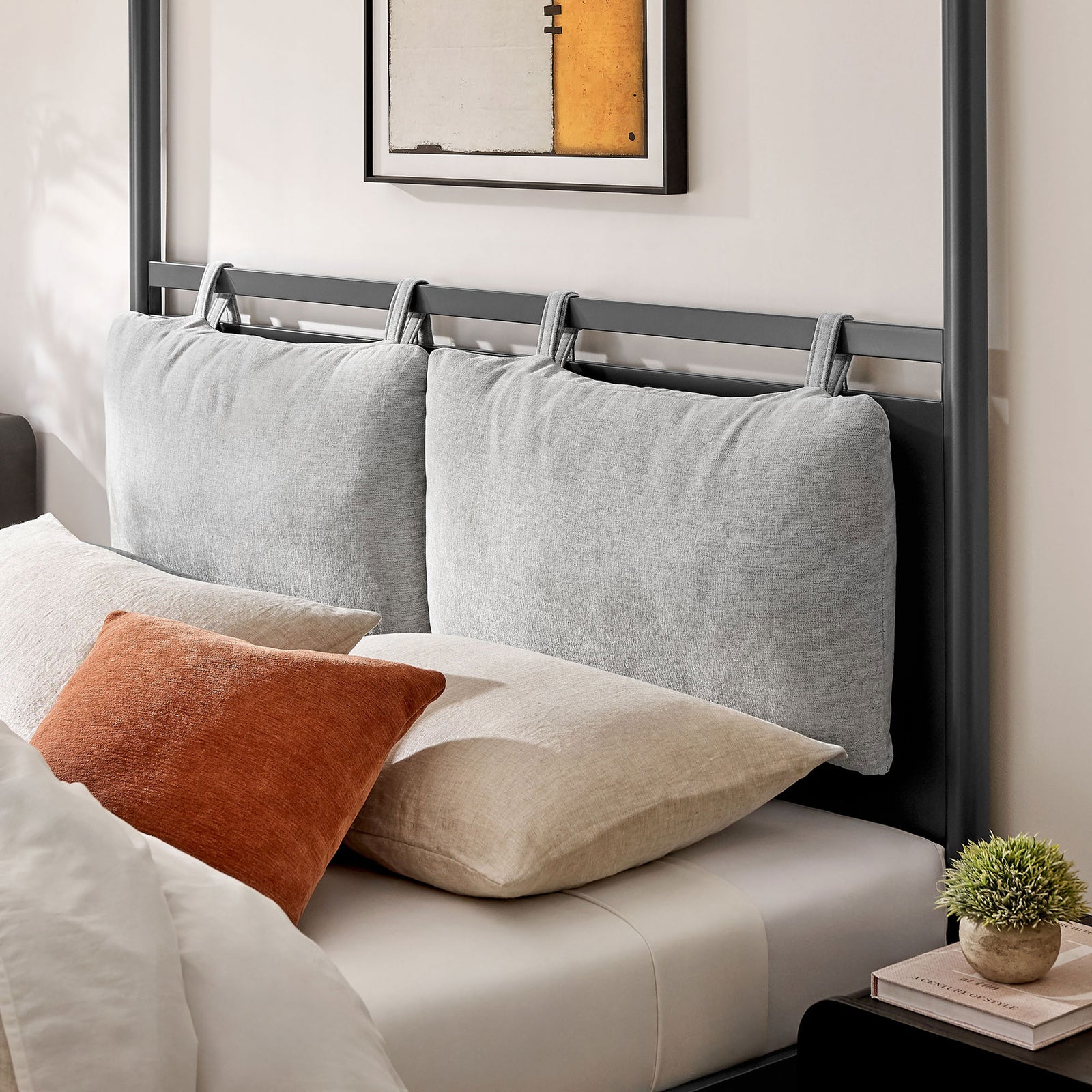 Cozy bedroom detail emphasizing the cushioned headboard and charcoal frame with warm accents || MOD-7223-CHA-NPT || detail_room
