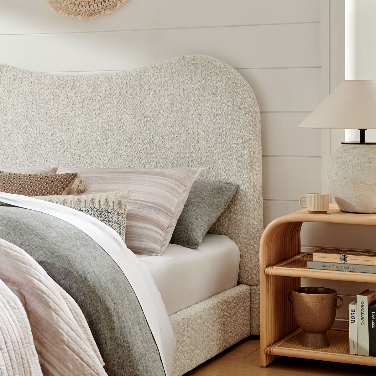 Soft boucle texture and graceful headboard bring inviting warmth to a serene bedside setting || MOD-7233-PRL || detail_room