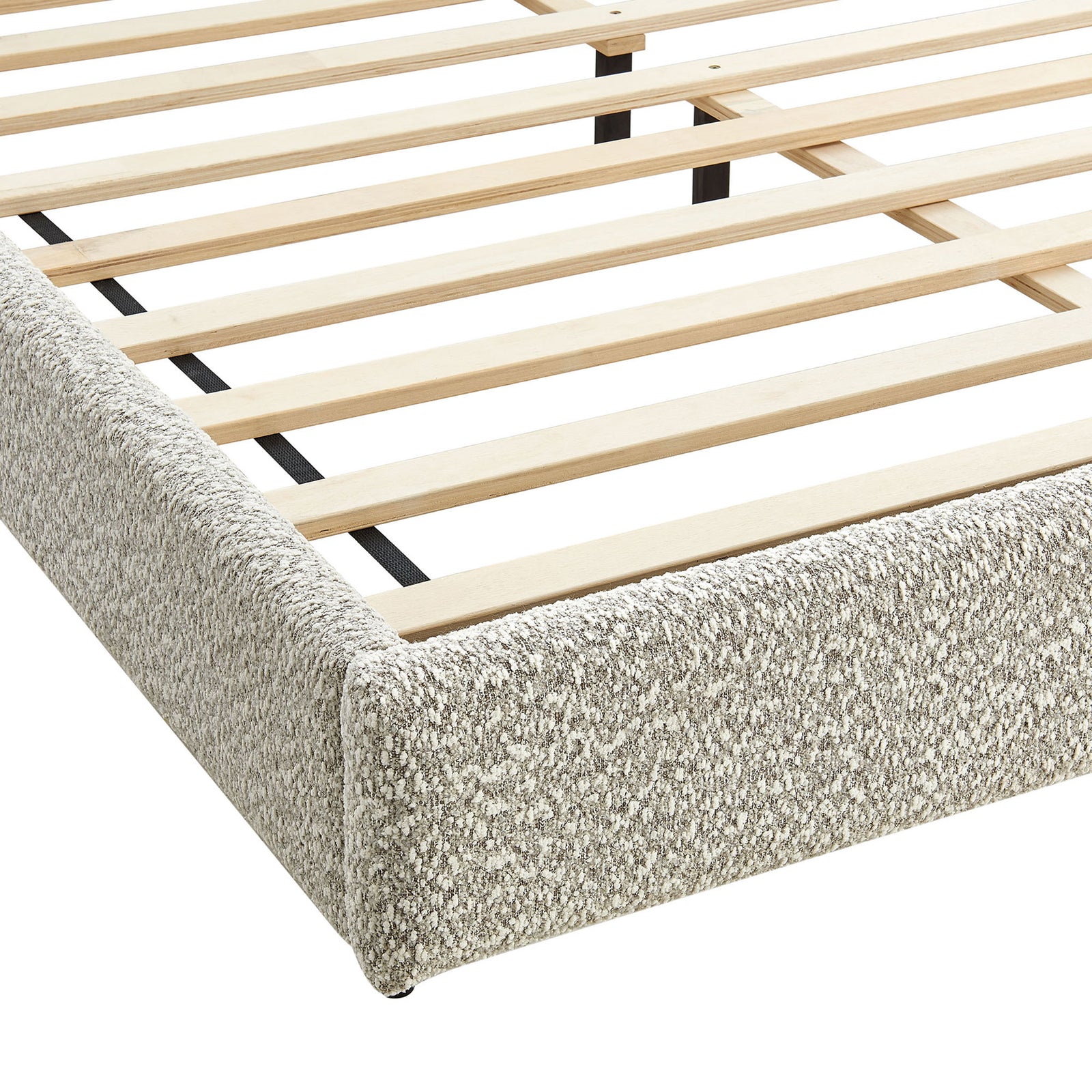 Textured boucle upholstery and smooth corner seams refine the low-profile bed base || MOD-7233-RIV || detail_studio