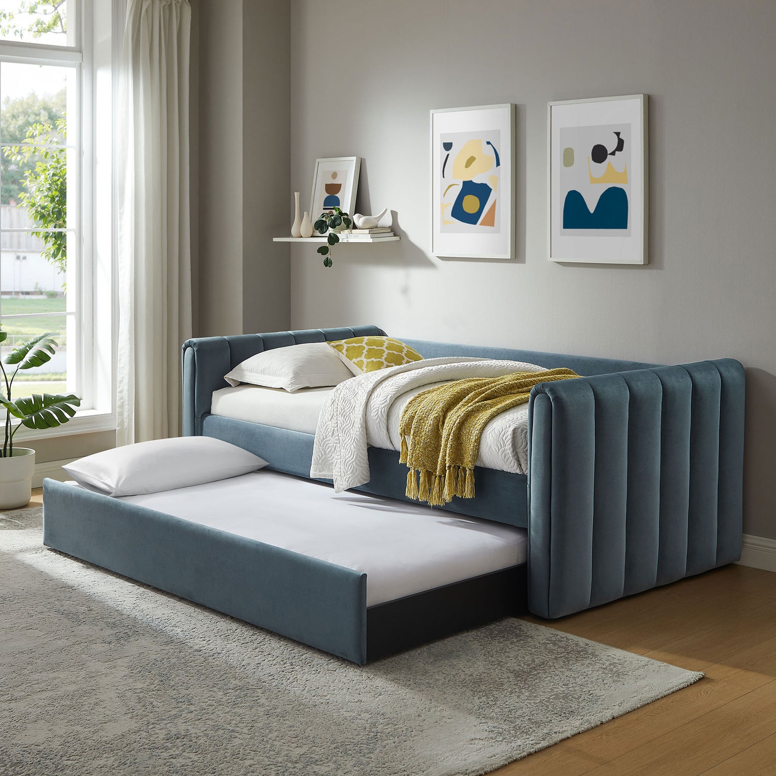 Daybed with pull-out trundle extended, offering extra sleep space in soft cadet blue velvet || MOD-7234-CAB || front_angle_open_room