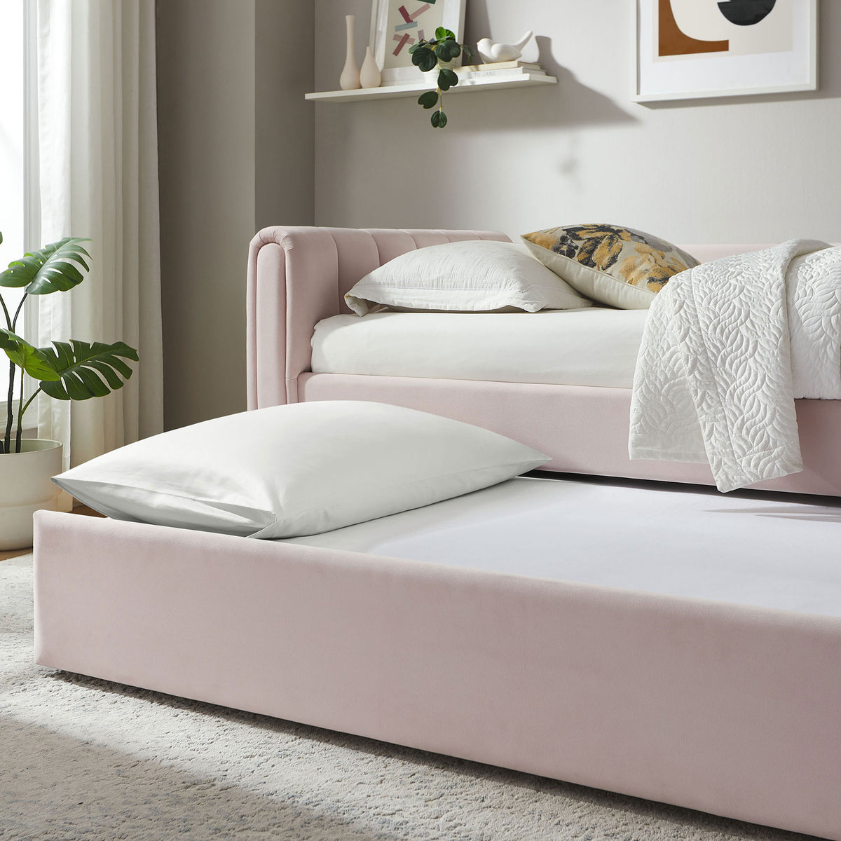 Trundle pulls out smoothly to create extra sleeping space in a modern, light-filled room || MOD-7234-PNK || detail_room