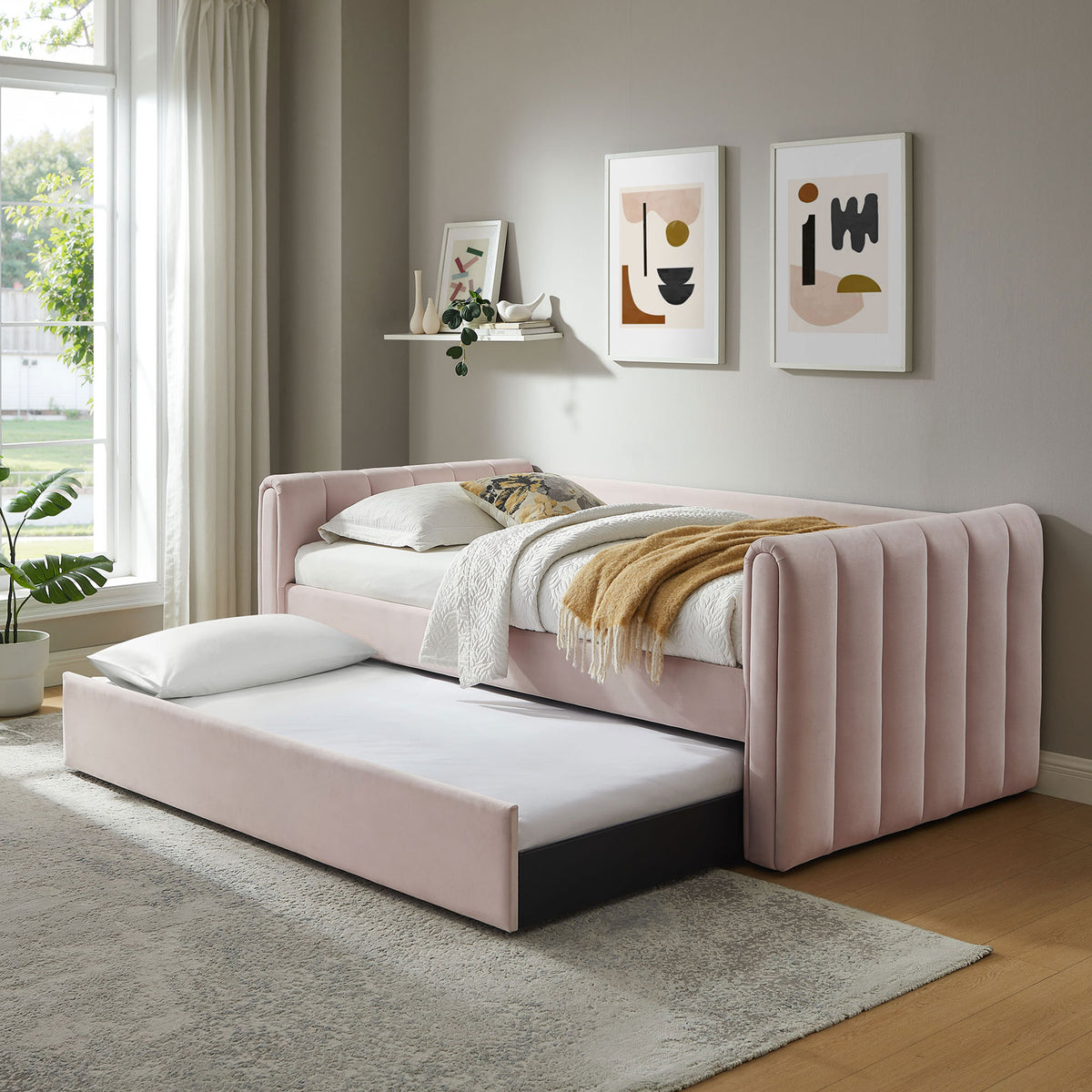 Versatile twin daybed with trundle complements contemporary decor while maximizing guest space || MOD-7234-PNK || front_angle_open_room