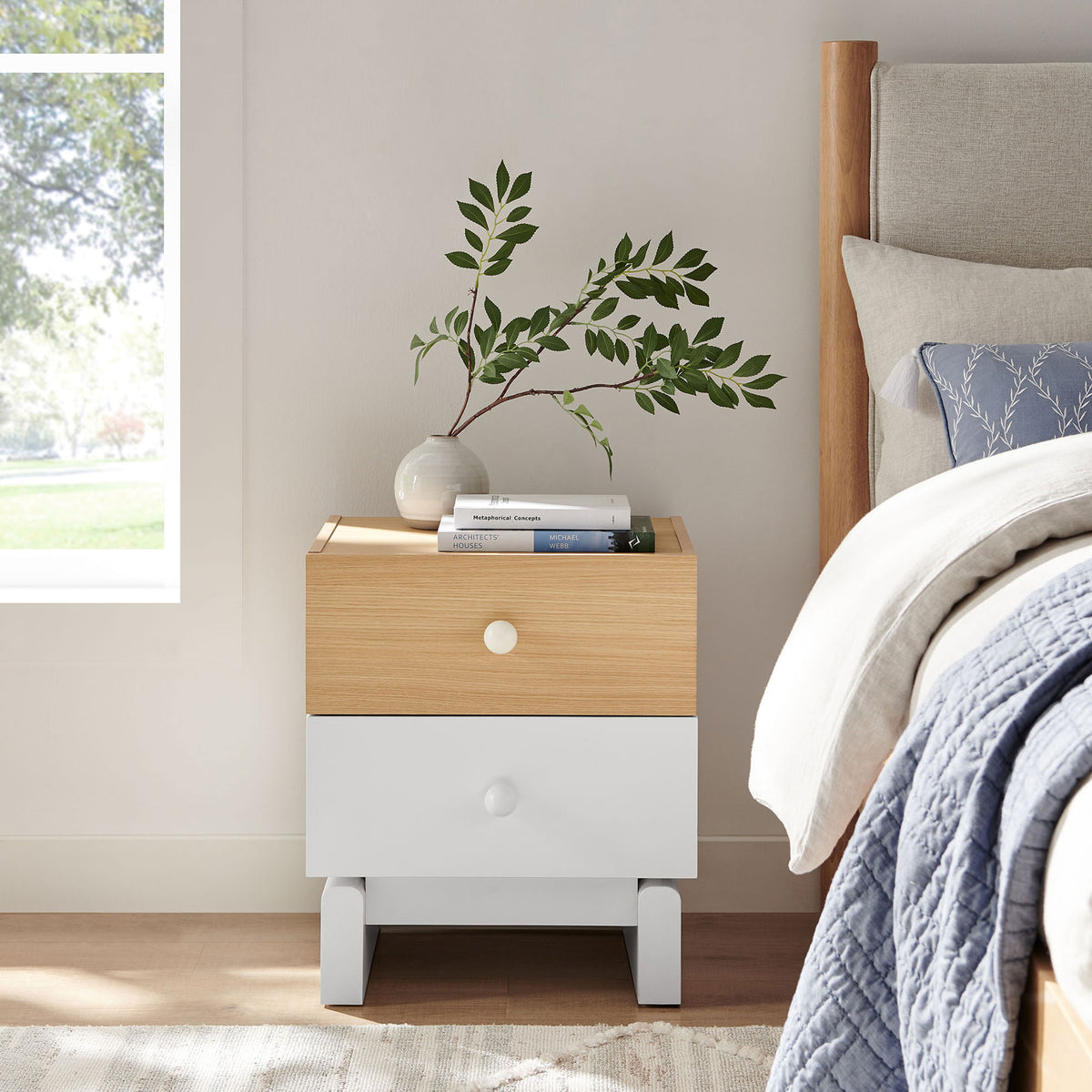 Nolia oak and white nightstand styled beside a bed with decor for an airy, modern bedroom || MOD-7238-OAK-WHI || front_angle_room