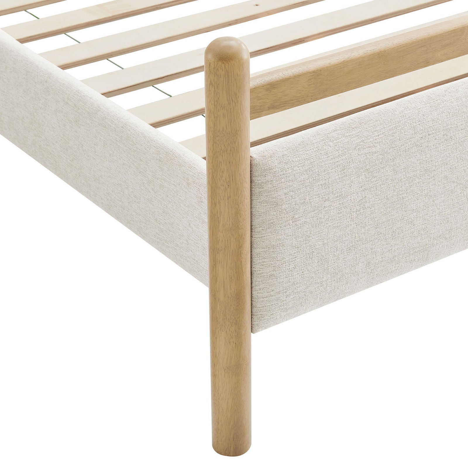 Rounded solid wood post and neatly tailored heathered ivory upholstery at the corner || MOD-7248-LOA-HEI || leg_studio