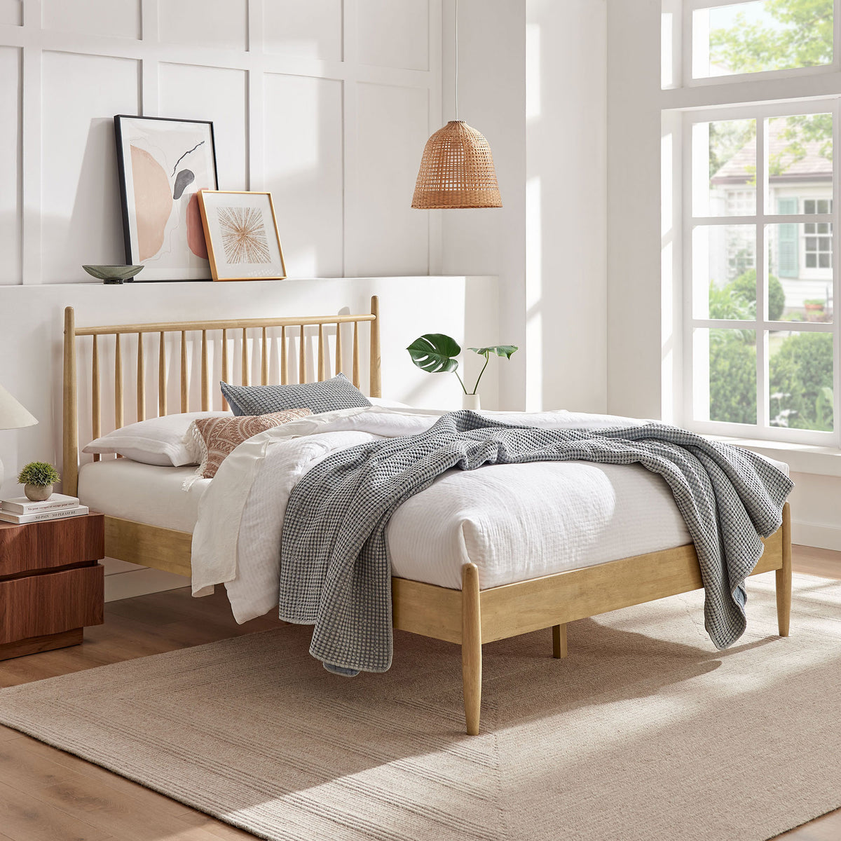 Airy spindle headboard and warm light oak finish bring mid-century charm to a bright, relaxed bedroom || MOD-7303-LOA || front_angle_room