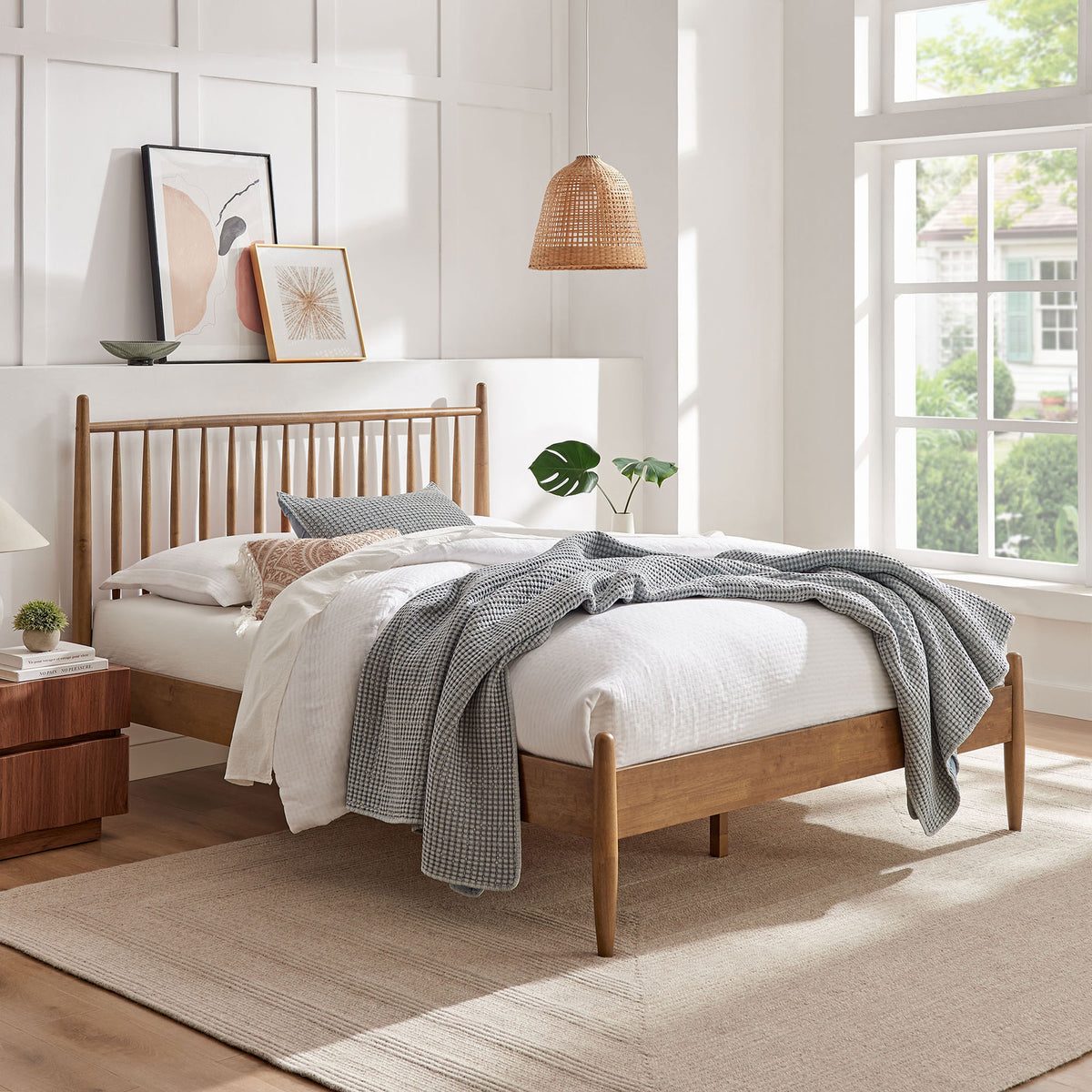Clean-lined walnut bed elevates the room with airy spindles and gently tapered posts. || MOD-7303-WAL || front_angle_room