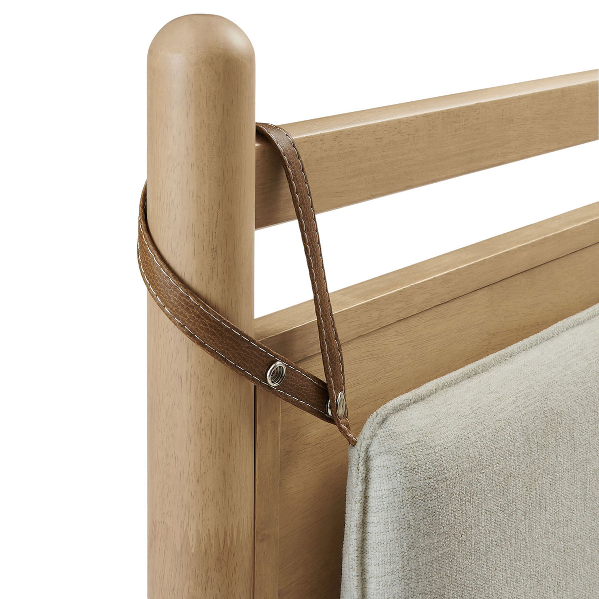 Stitched faux leather strap detail securing the cushioned headboard pillow || MOD-7313-LOA-HEI || detail_studio