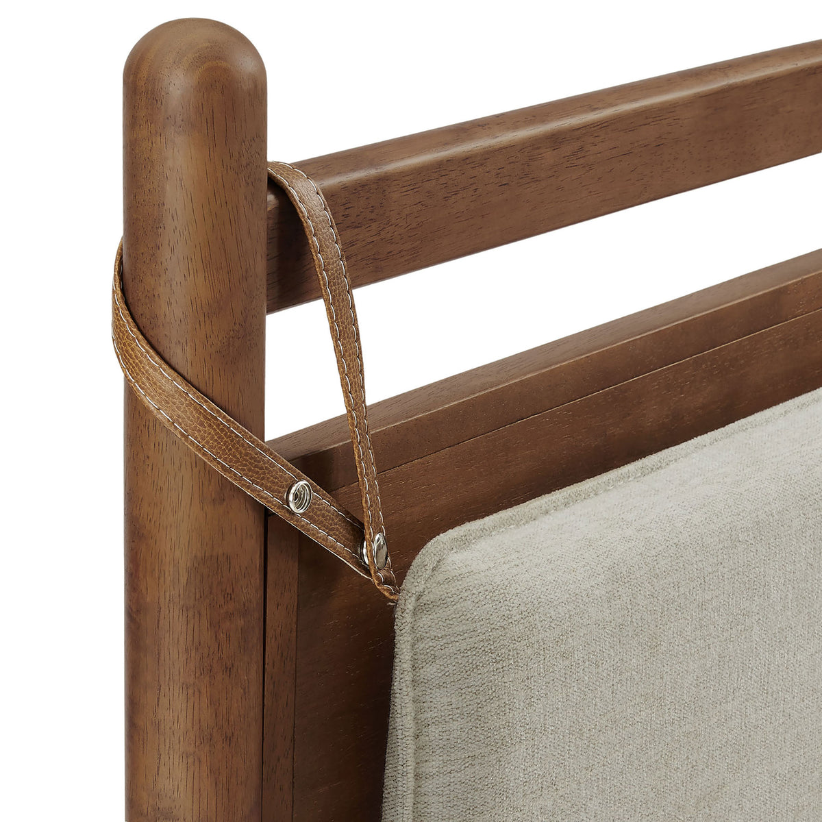 Faux leather strap detail securing the cushioned headboard pillow || MOD-7313-WAL-HEI || detail_studio