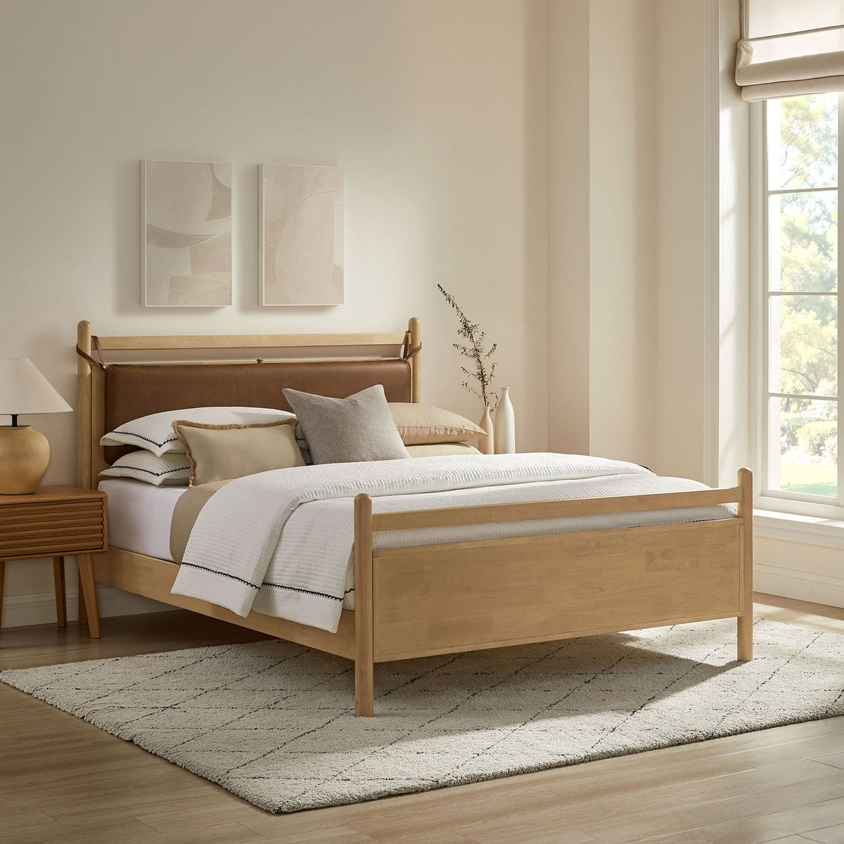 Warm, inviting platform bed with layered neutral bedding and light oak frame || MOD-7314-LOA-CYN || front_angle_room