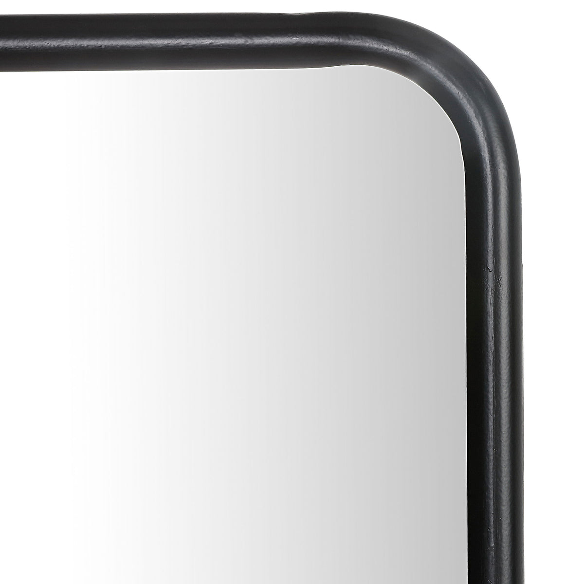 A gently rounded corner and smooth black frame give the mirror a refined look. || MRR1041A || detail_studio