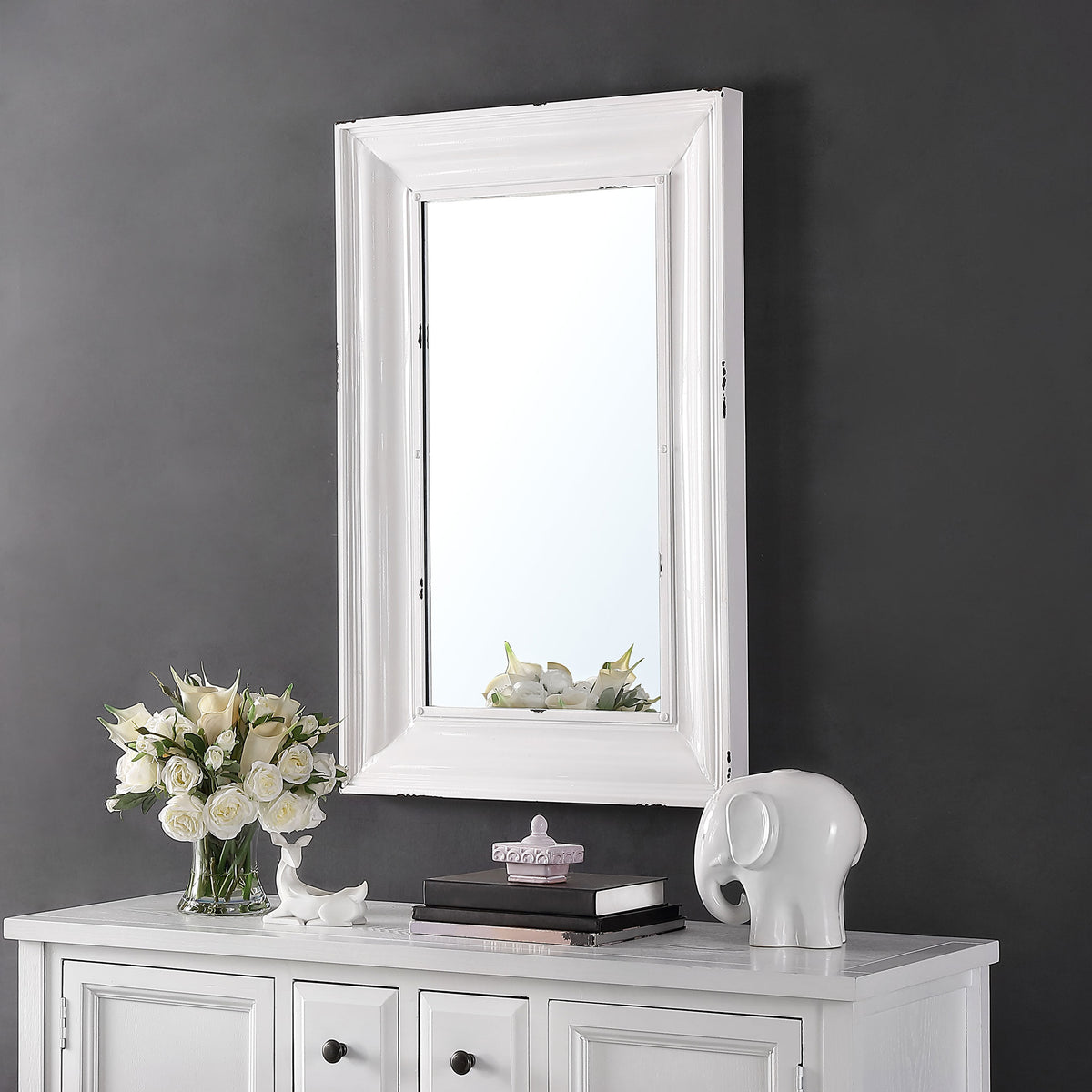 White paneled framing adds farmhouse charm above a dresser || MRR1059A || front_room