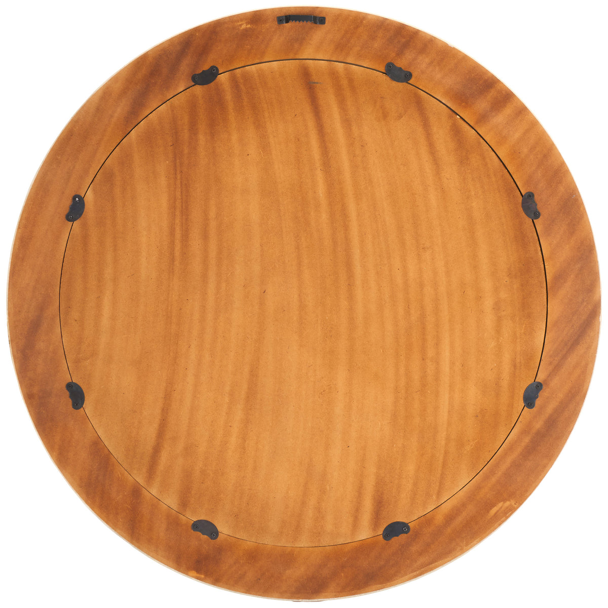 A warm brown backing and discreet metal hanger make the round mirror ready for wall display. || MRR1501A || back_studio