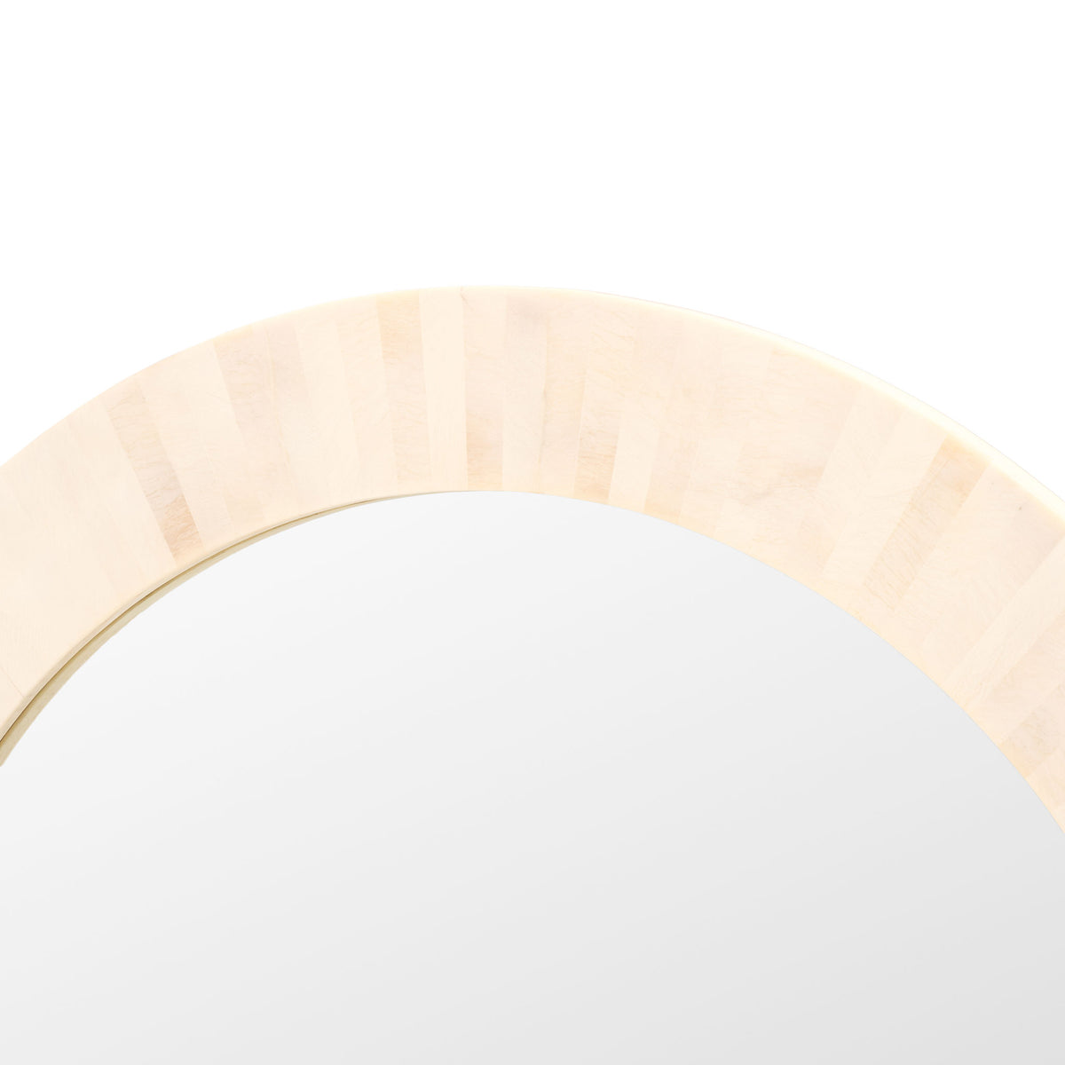 The wide frame has softly striped ivory faux-bone panels bordering smooth reflective glass. || MRR1501A || detail_studio