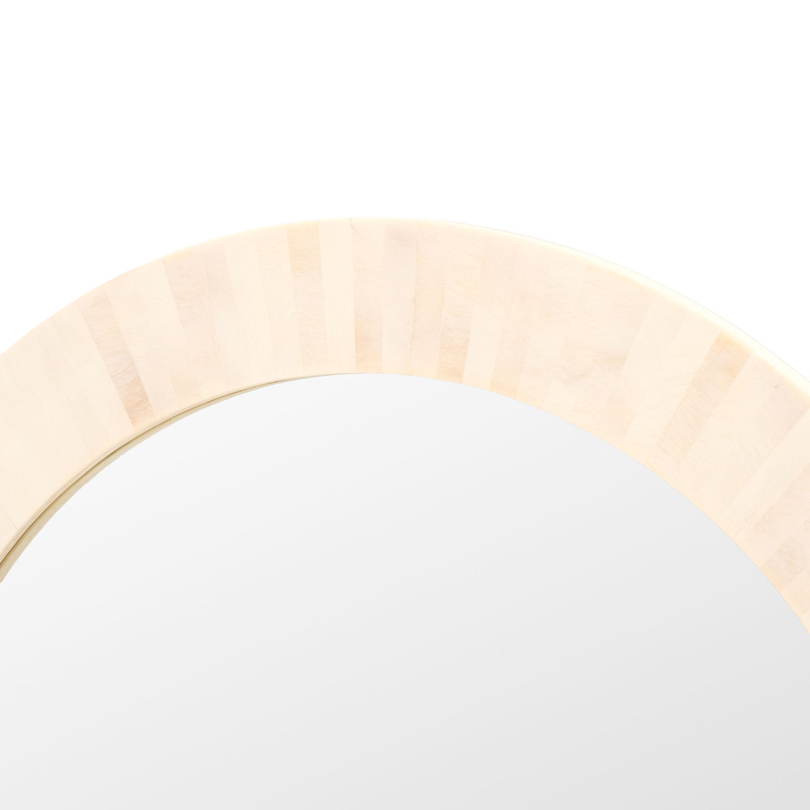 The wide frame has softly striped ivory faux-bone panels bordering smooth reflective glass. || MRR1501A || detail_studio