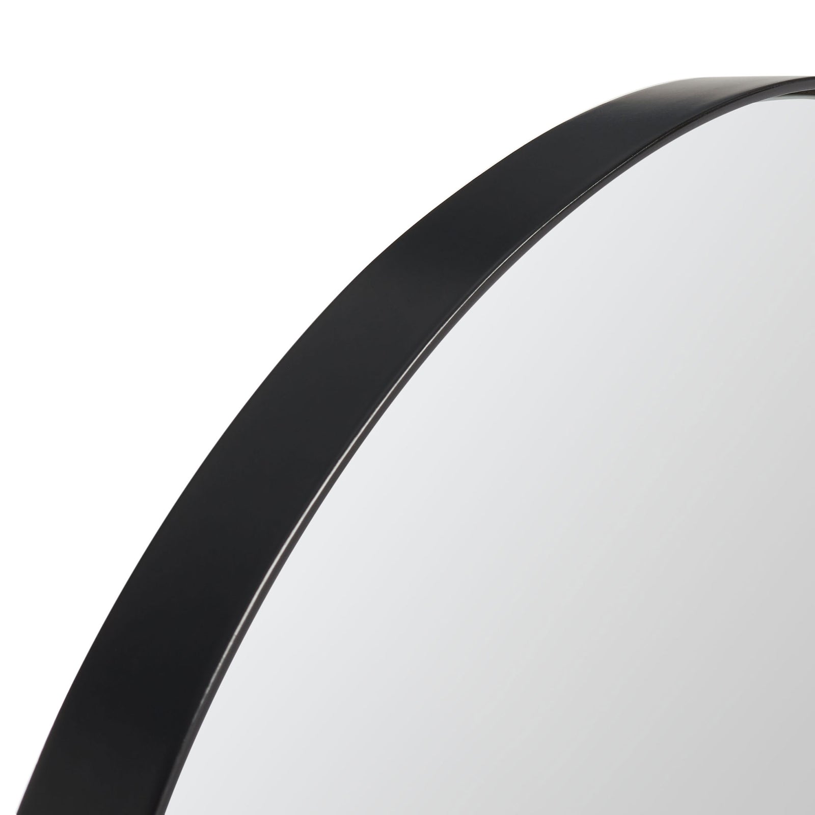 A curved black metal frame lends a bold, clean outline to the arched mirror. || MRR2009C || detail_studio