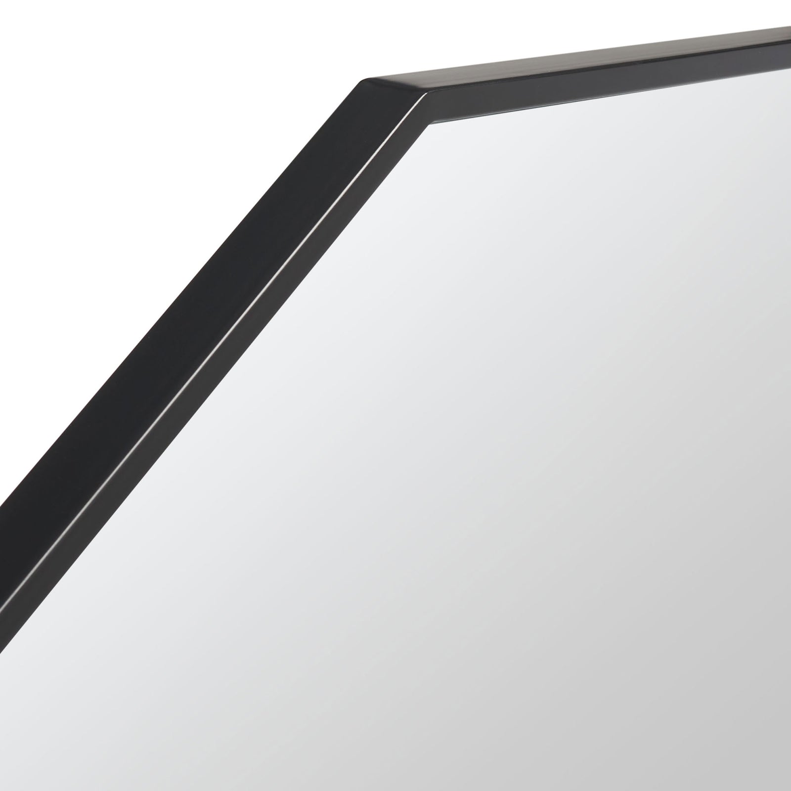 Slim black metal framing defines a crisp, angled edge around reflective glass || MRR2010B || detail_studio