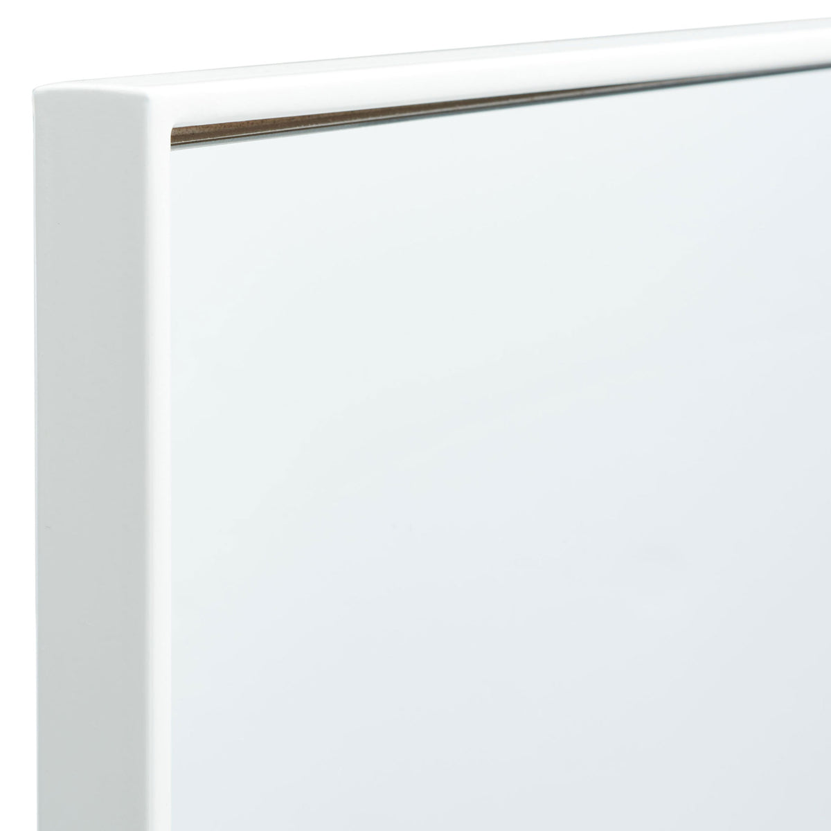 A smooth white metal frame meets at a neat right angle around the reflective glass. || MRR2011A || detail_studio