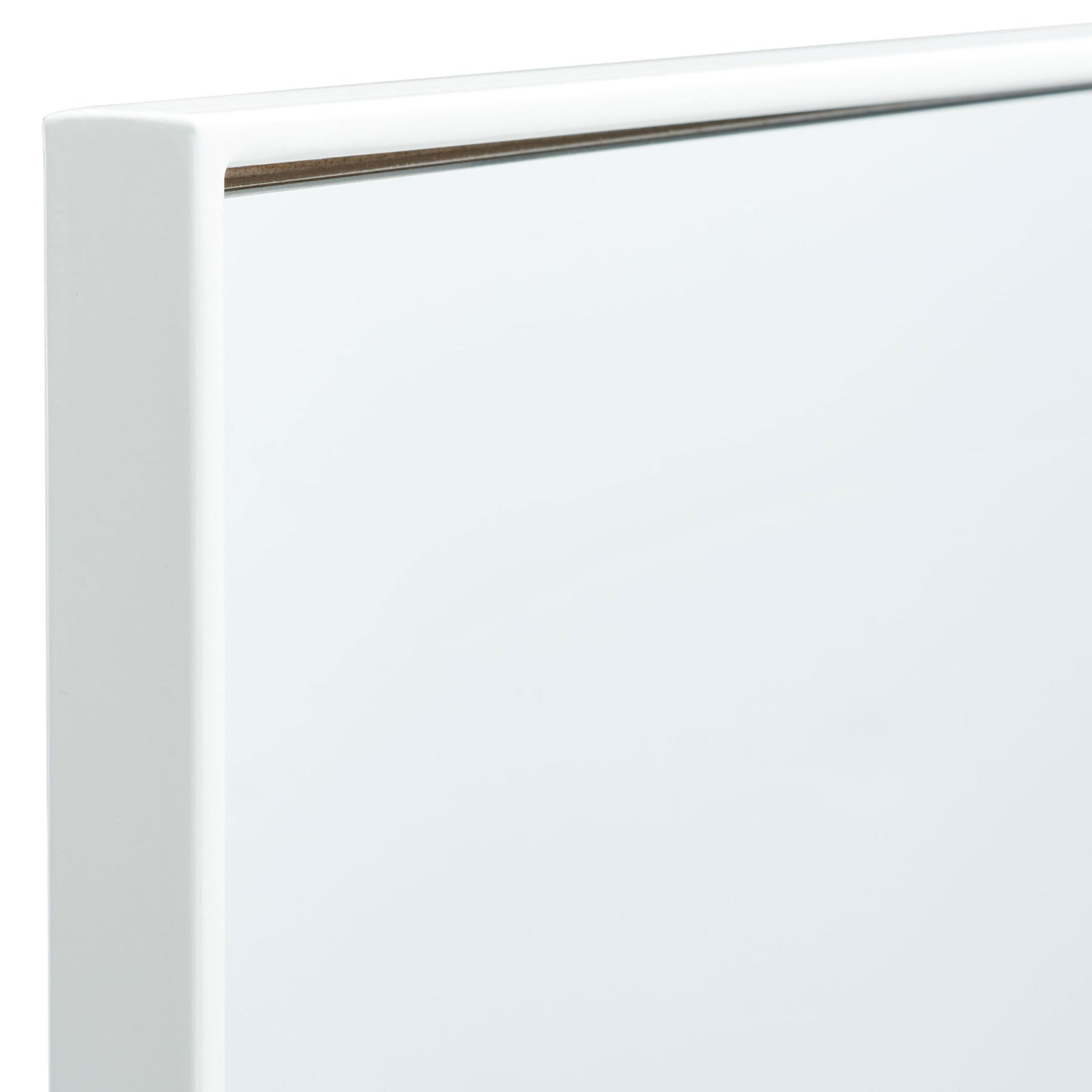A smooth white metal frame meets at a neat right angle around the reflective glass. || MRR2011A || detail_studio