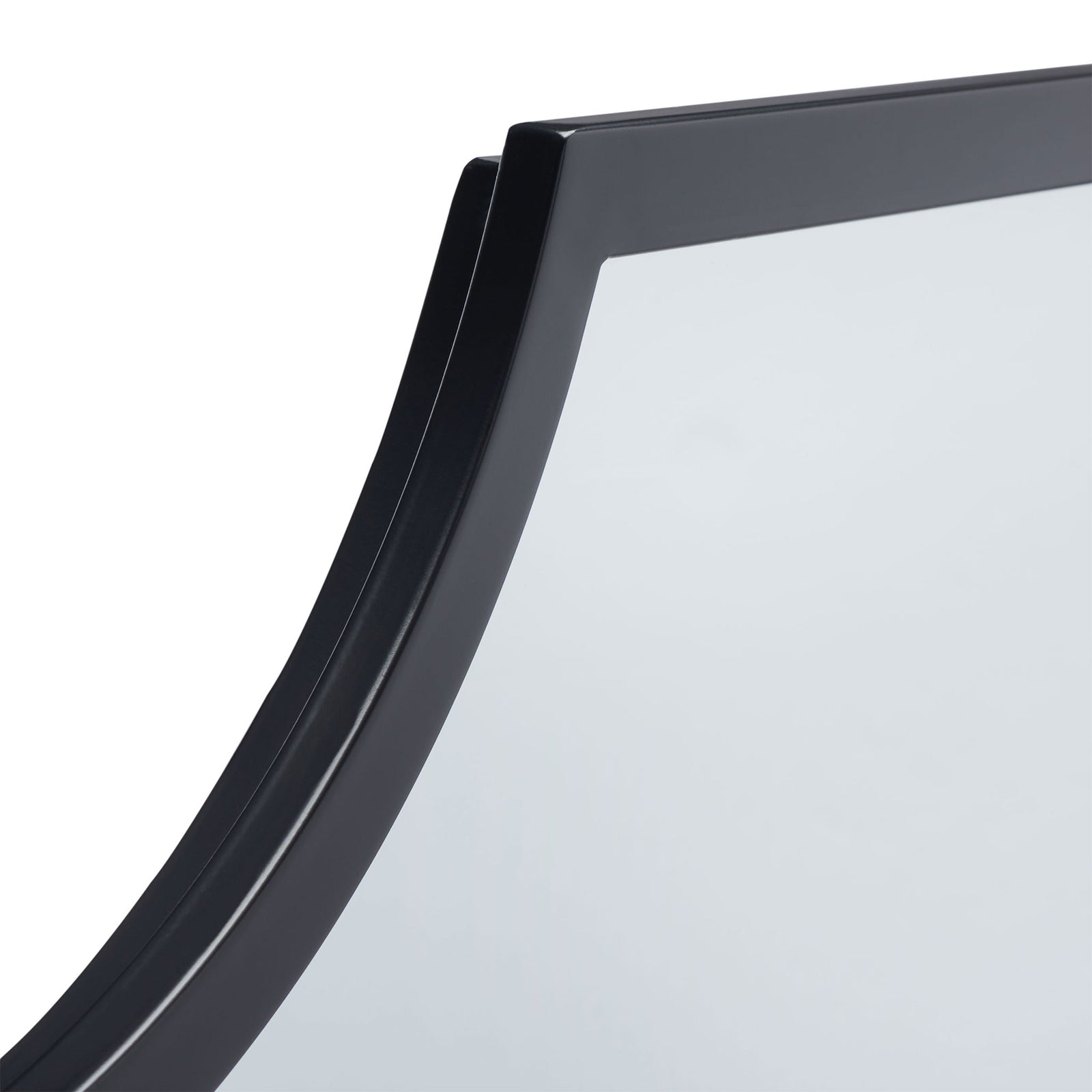 A smooth black metal frame follows the mirror's sculpted curved edge. || MRR2012B || detail_studio