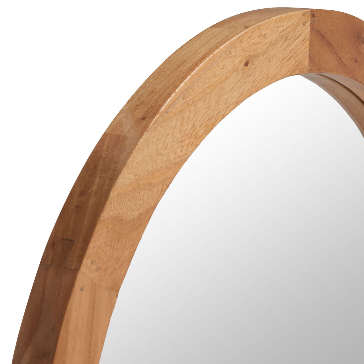 Warm wood grain and gently beveled edges lend natural character to the round mirror frame.