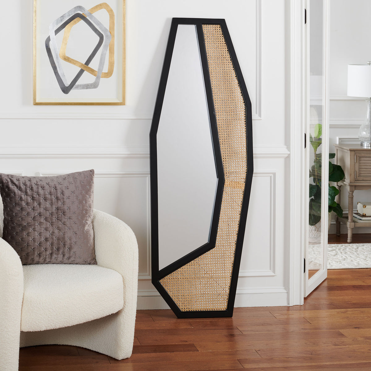 Bold black edges and warm woven texture define a tall geometric mirror. || MRR2018A || front_room