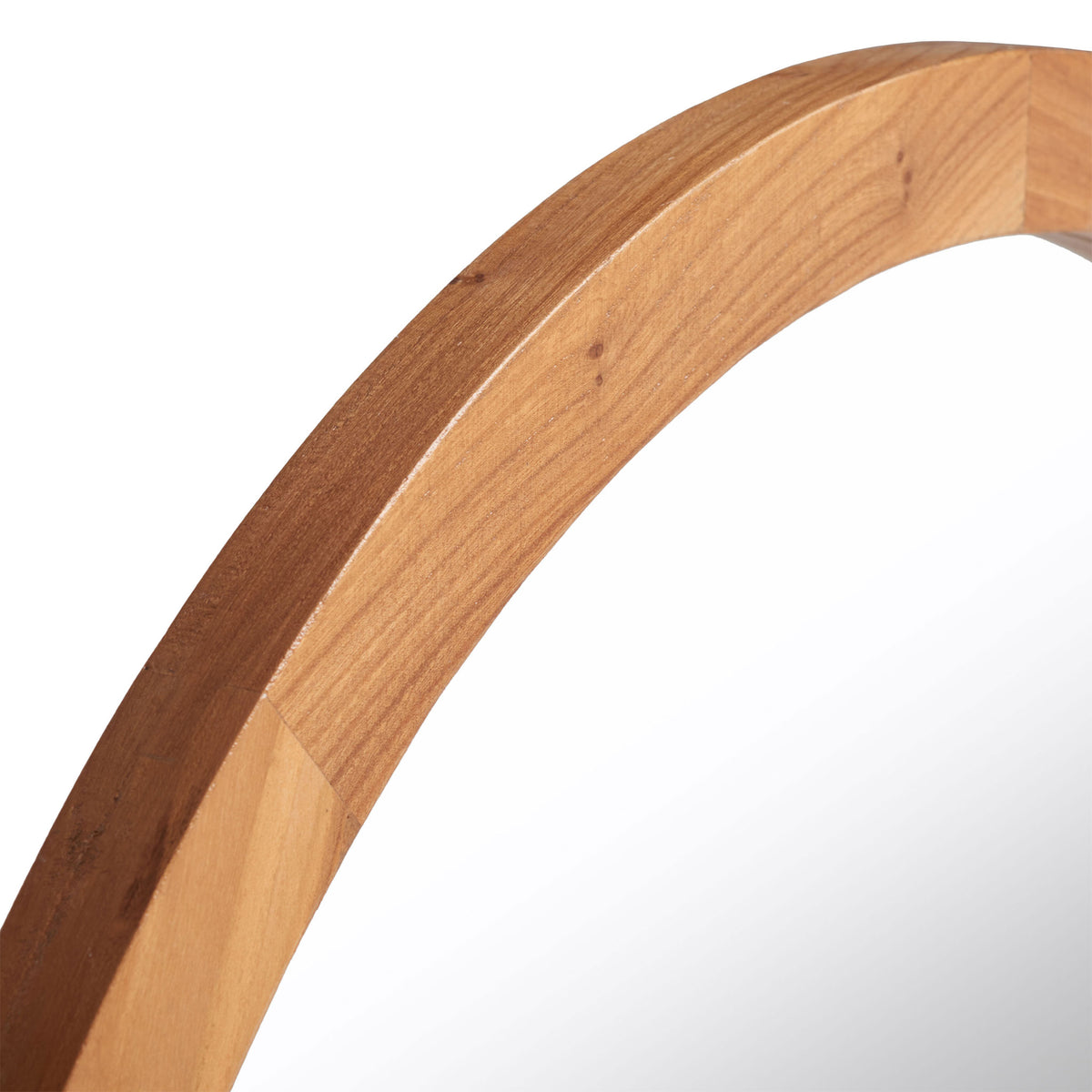 Warm wood grain brings organic texture to the mirror's gently curved frame. || MRR2019B || detail_studio
