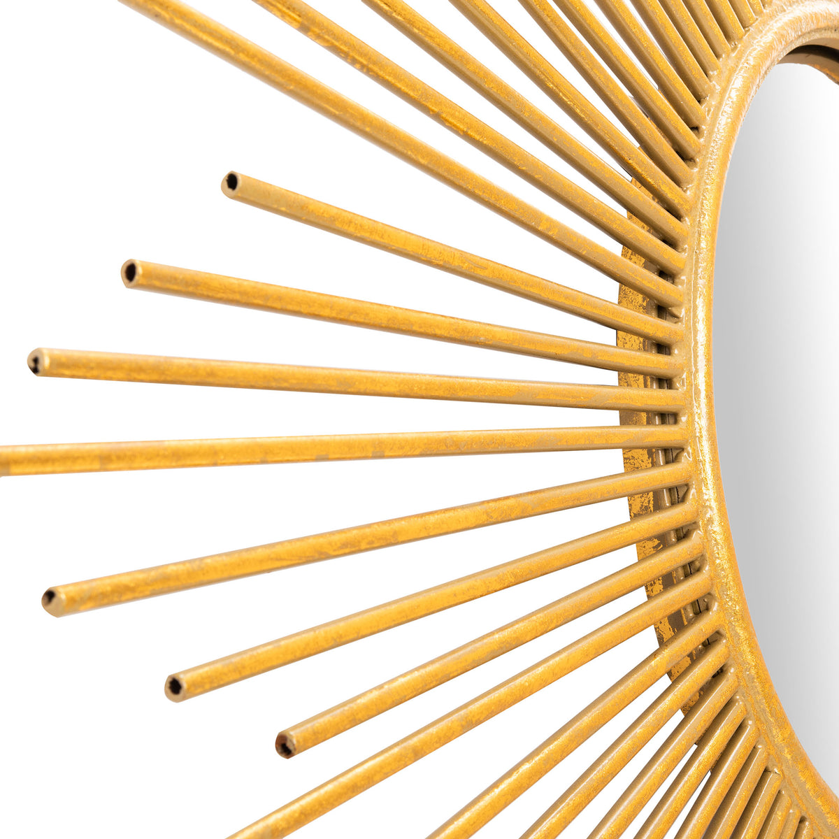 Radiating gold iron rods create an airy sunburst around a textured circular frame || MRR3009A || detail_studio
