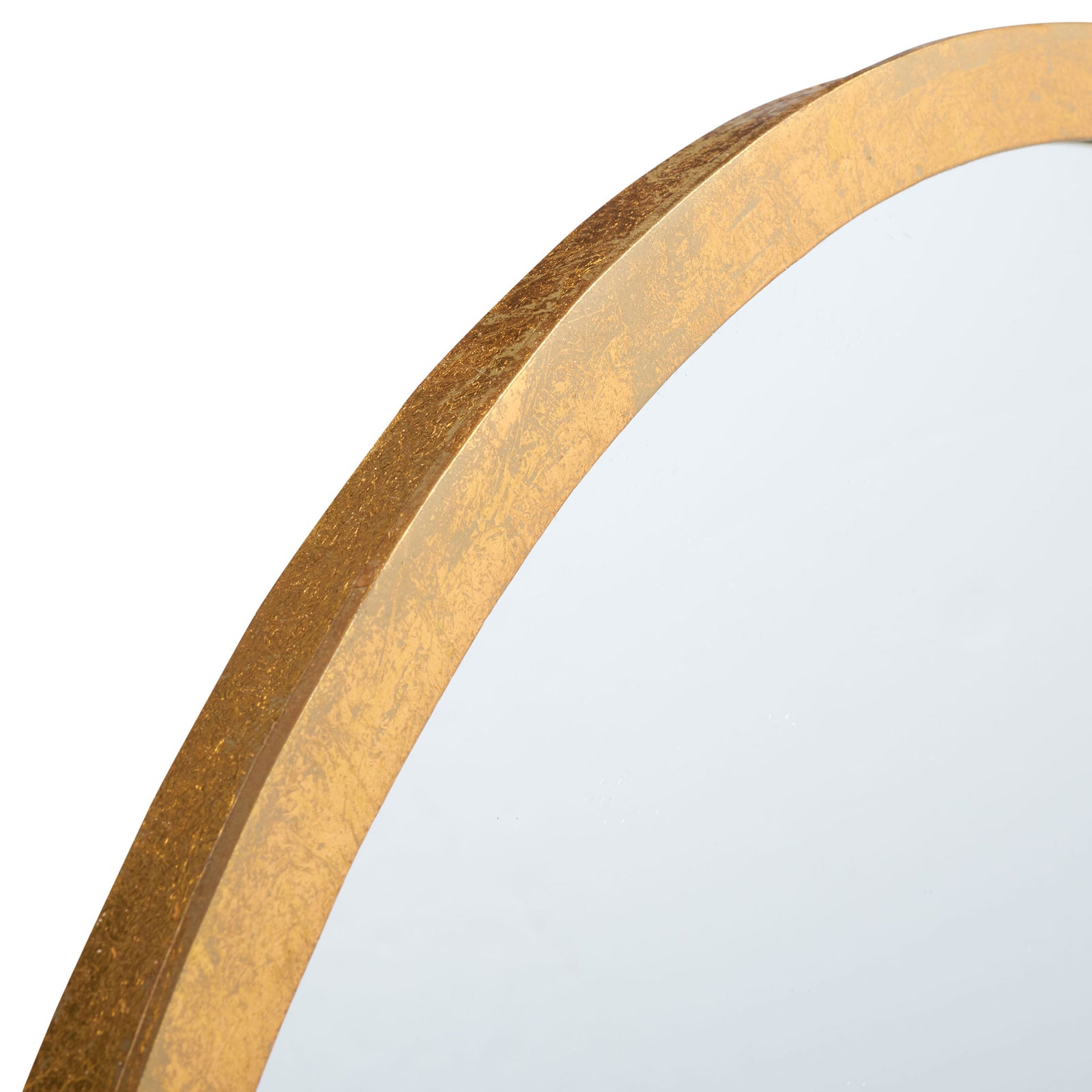 Subtly textured gold iron frame adds warmth along the mirror's curved edge || MRR3033A || detail_studio