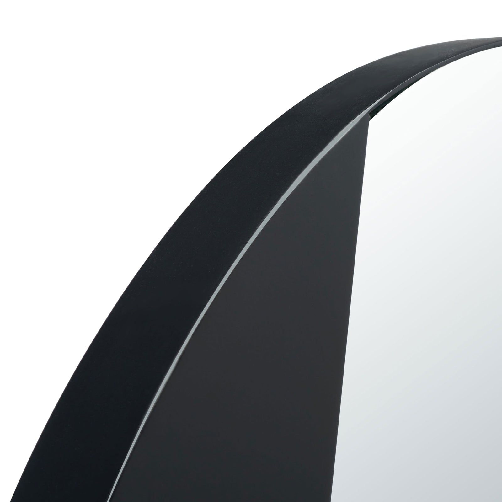 Curved matte black metal meets reflective glass along the mirror's edge. || MRR3039A || detail_studio