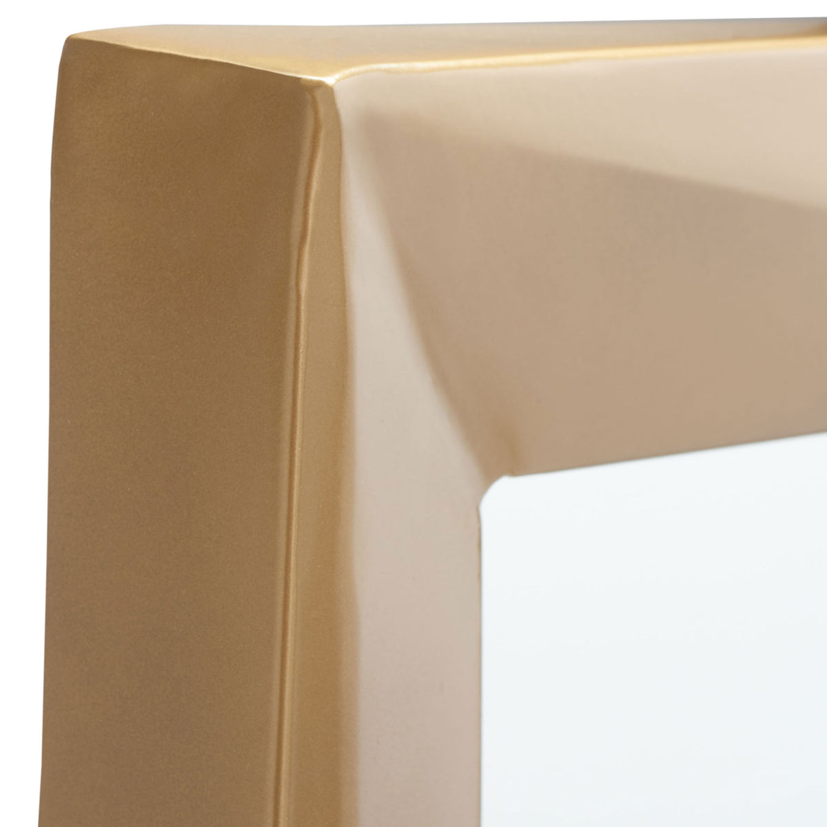 Gently folded corners give the lustrous brass-finished frame sculptural depth. || MRR3041A || detail_studio