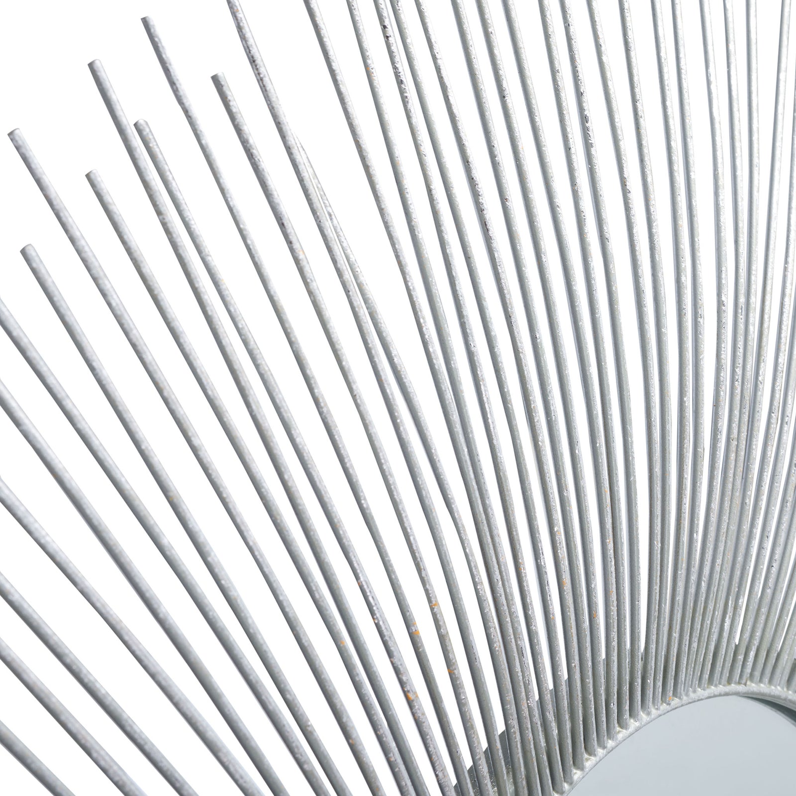 Slender silver rods radiate from a textured rim around the round mirror || MRR3045A || detail_studio