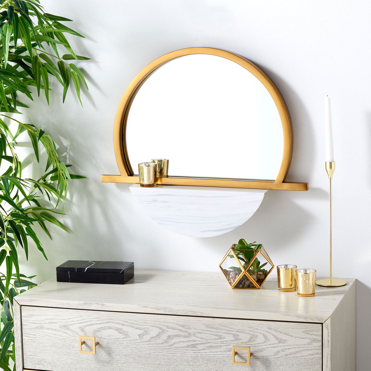 A gold arch, slim shelf, and white marble-look accent bring airy style to the wall || MRR3056A || front_room