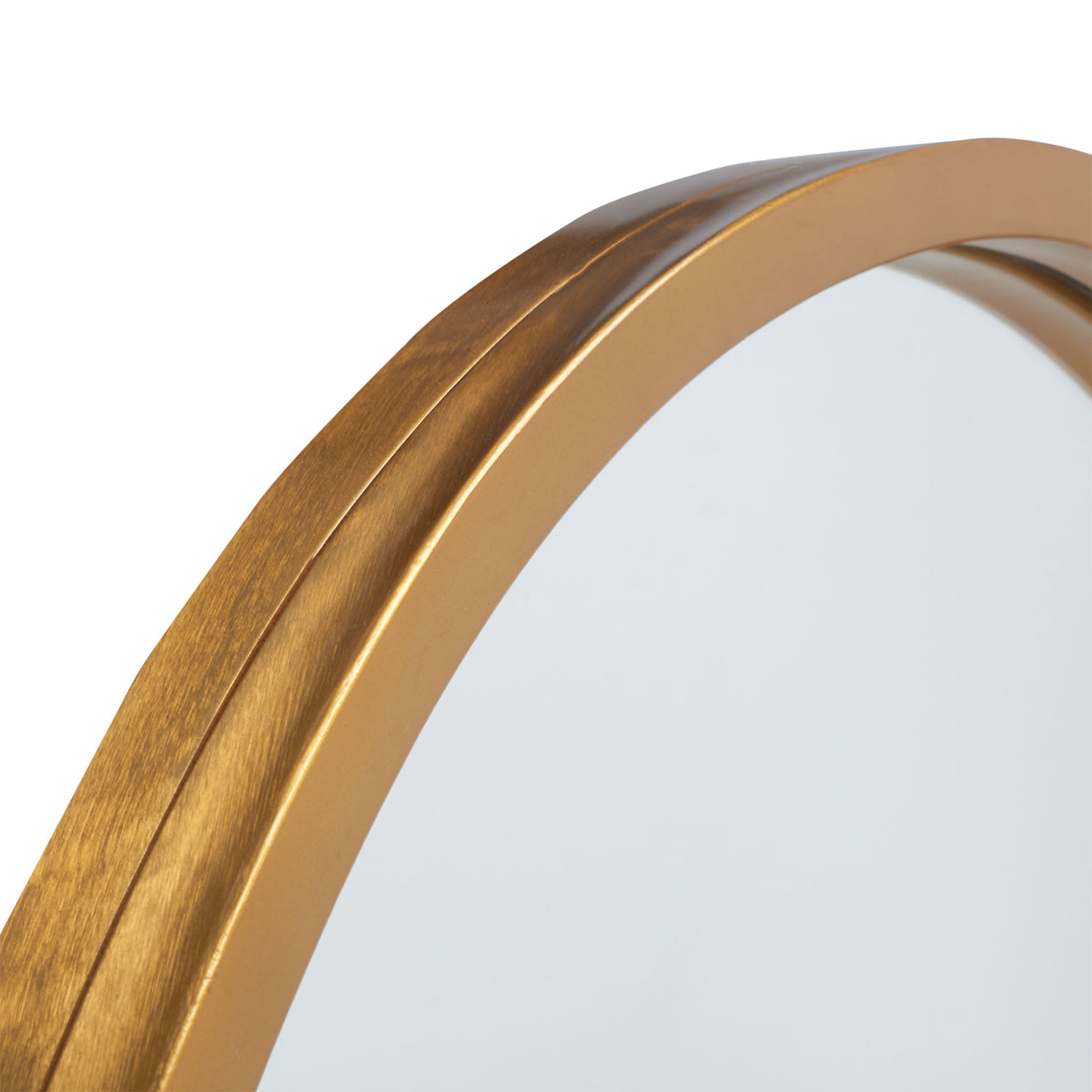 Curved gold metal trim shows subtle brushed texture beside the mirror glass || MRR3057A || detail_studio