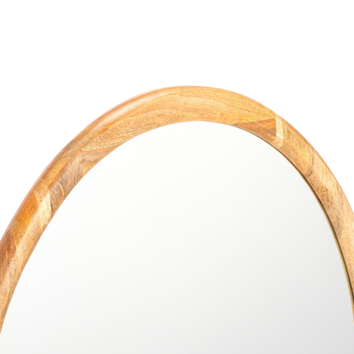 Curved mango wood frame shows off its varied grain beside the smooth mirror surface || MRR4003A || detail_studio