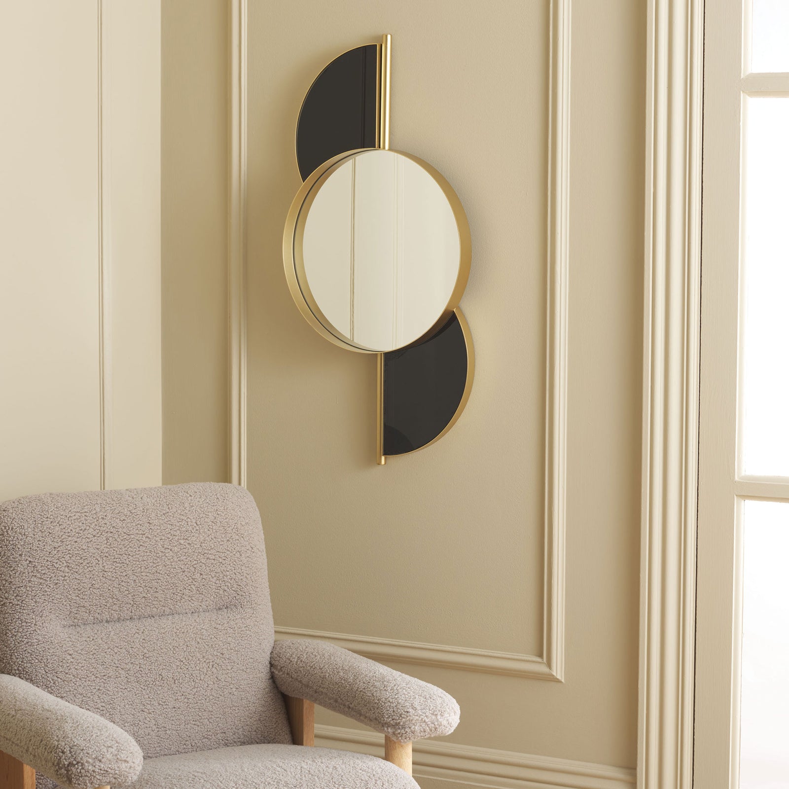 Black semicircular accents and a gold-framed mirror add graphic contrast to a paneled wall || MRR8004A || front_angle_room