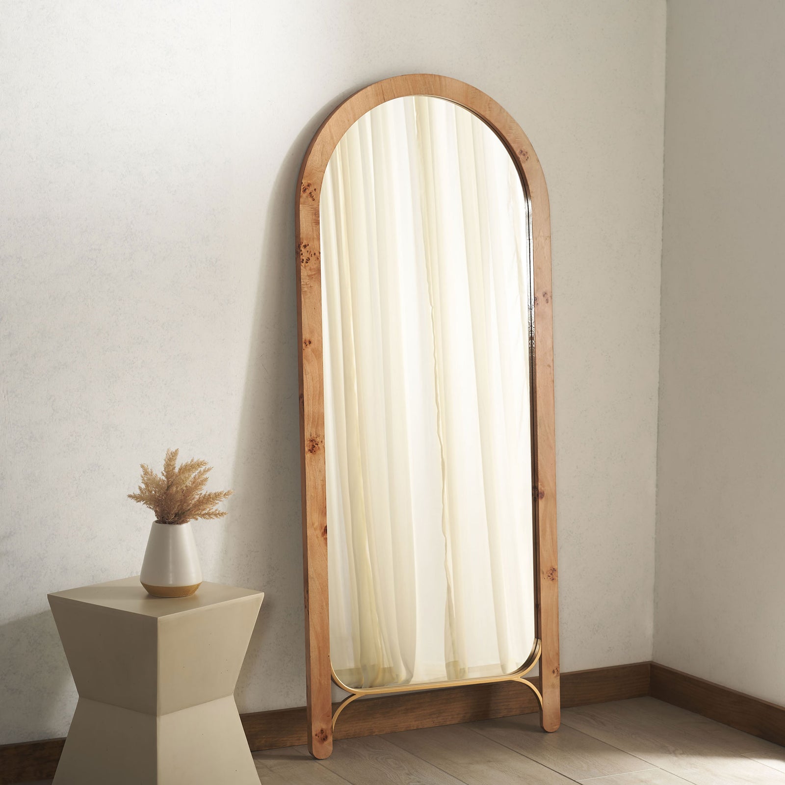 Natural wood arched mirror brings warmth and an expansive reflection to the room || MRR9013A || front_room