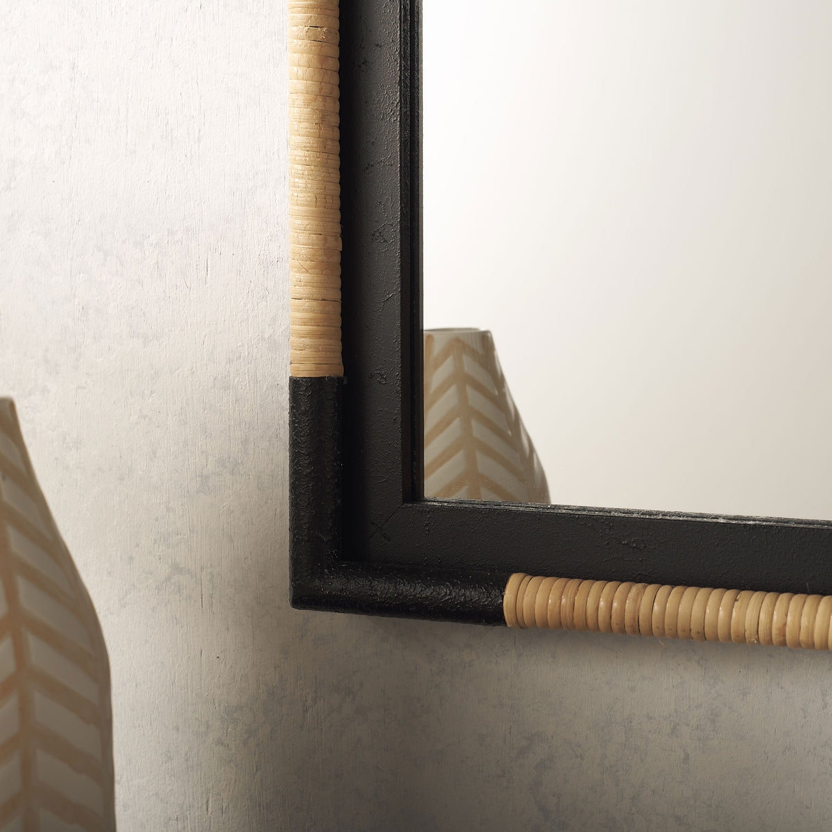 Tightly wrapped natural rope adds warmth to the mirror's squared black frame || MRR9016A || detail_room