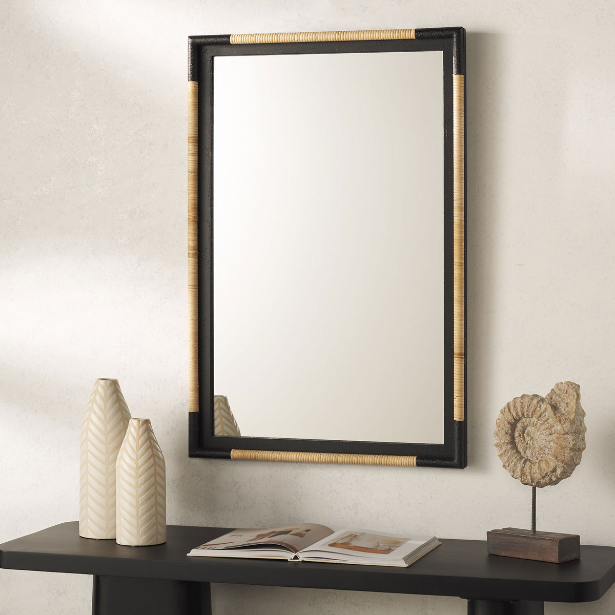 A black-framed wall mirror with natural rope accents adds contrast and texture above a console table || MRR9016A || front_room