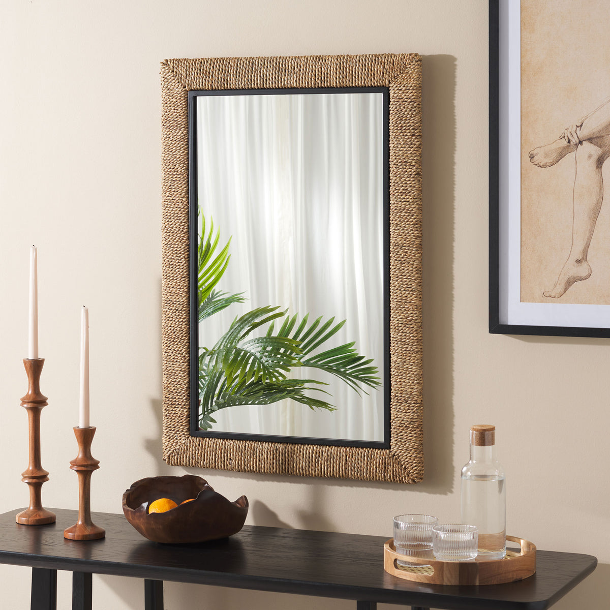 Woven rope and black trim bring natural texture to the wall above a sleek console. || MRR9017A || front_room