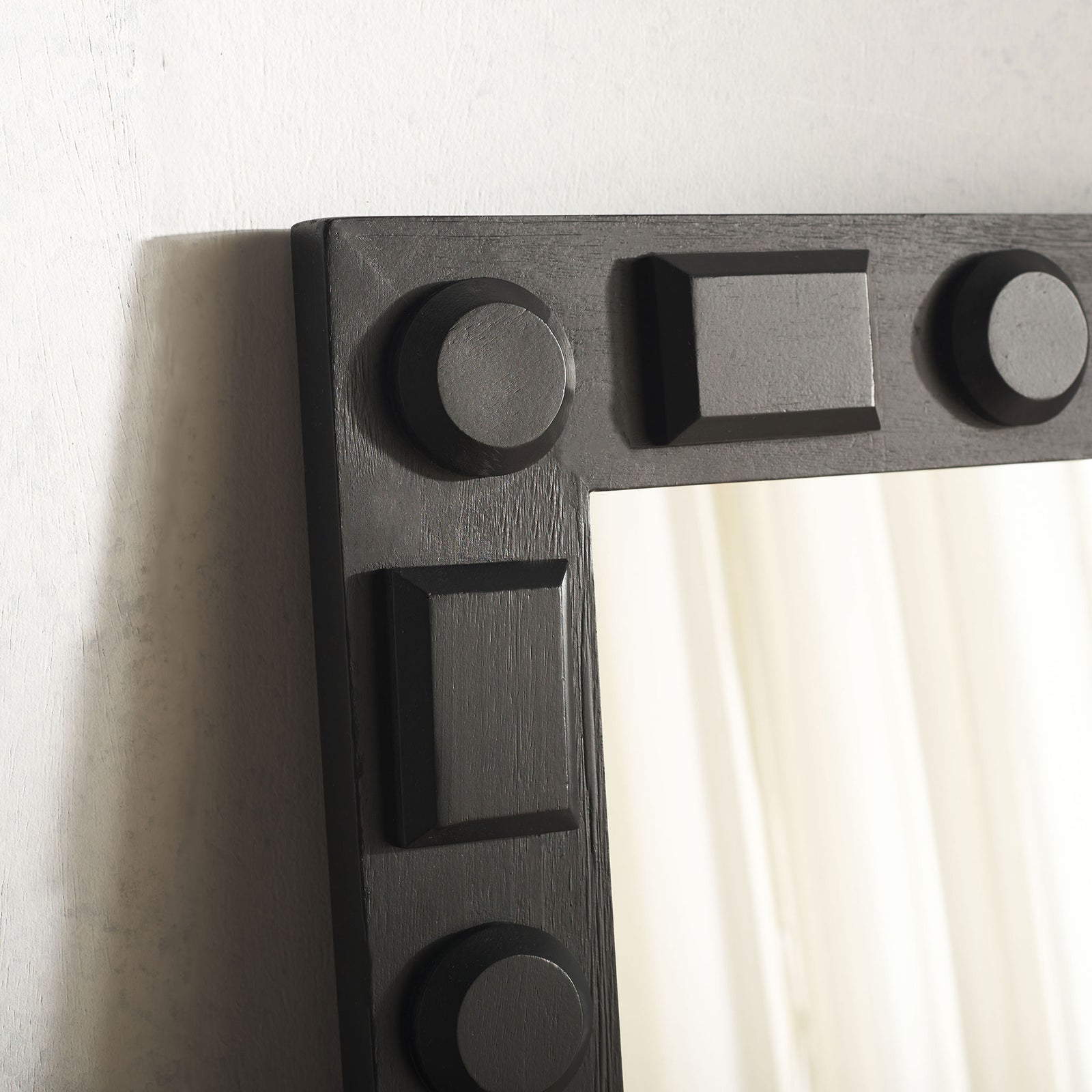 Visible wood grain adds texture to the black frame's raised geometric details || MRR9022A || detail_room