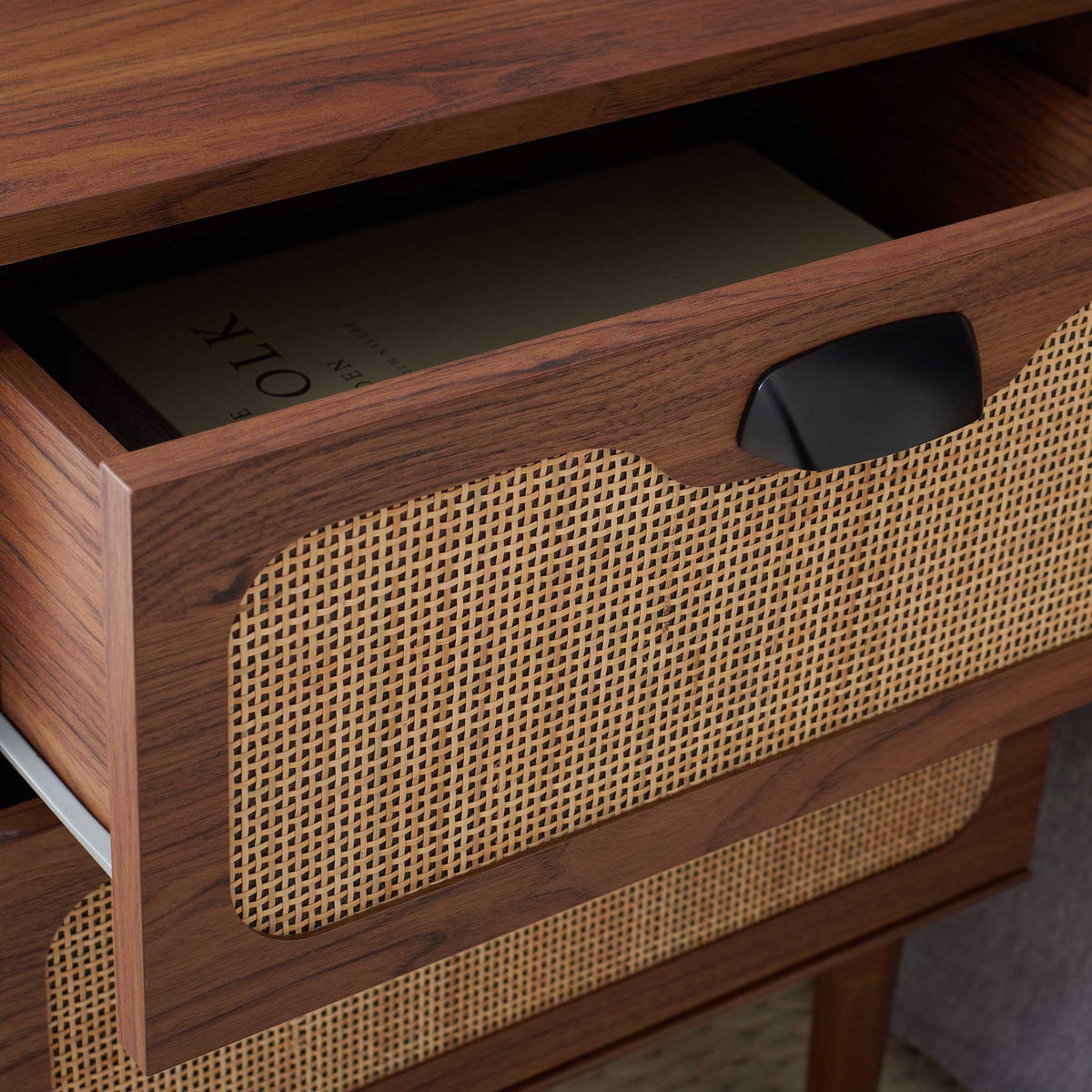 Open drawer reveals roomy storage with smooth glides behind a woven rattan front || NST9602A || storage_open_room