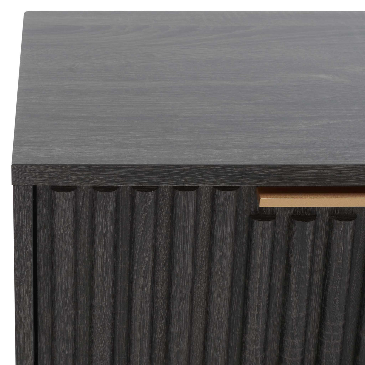 Crisp top edge meets fluted facade in richly textured distressed black
