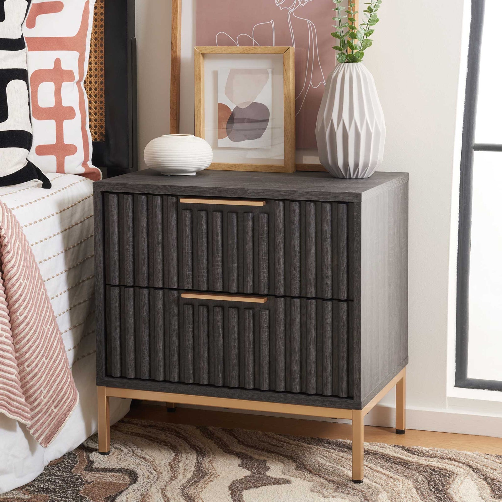 Stylish bedside storage with fluted drawers and brass-tone base elevates any room || NST9605E || front_angle_room